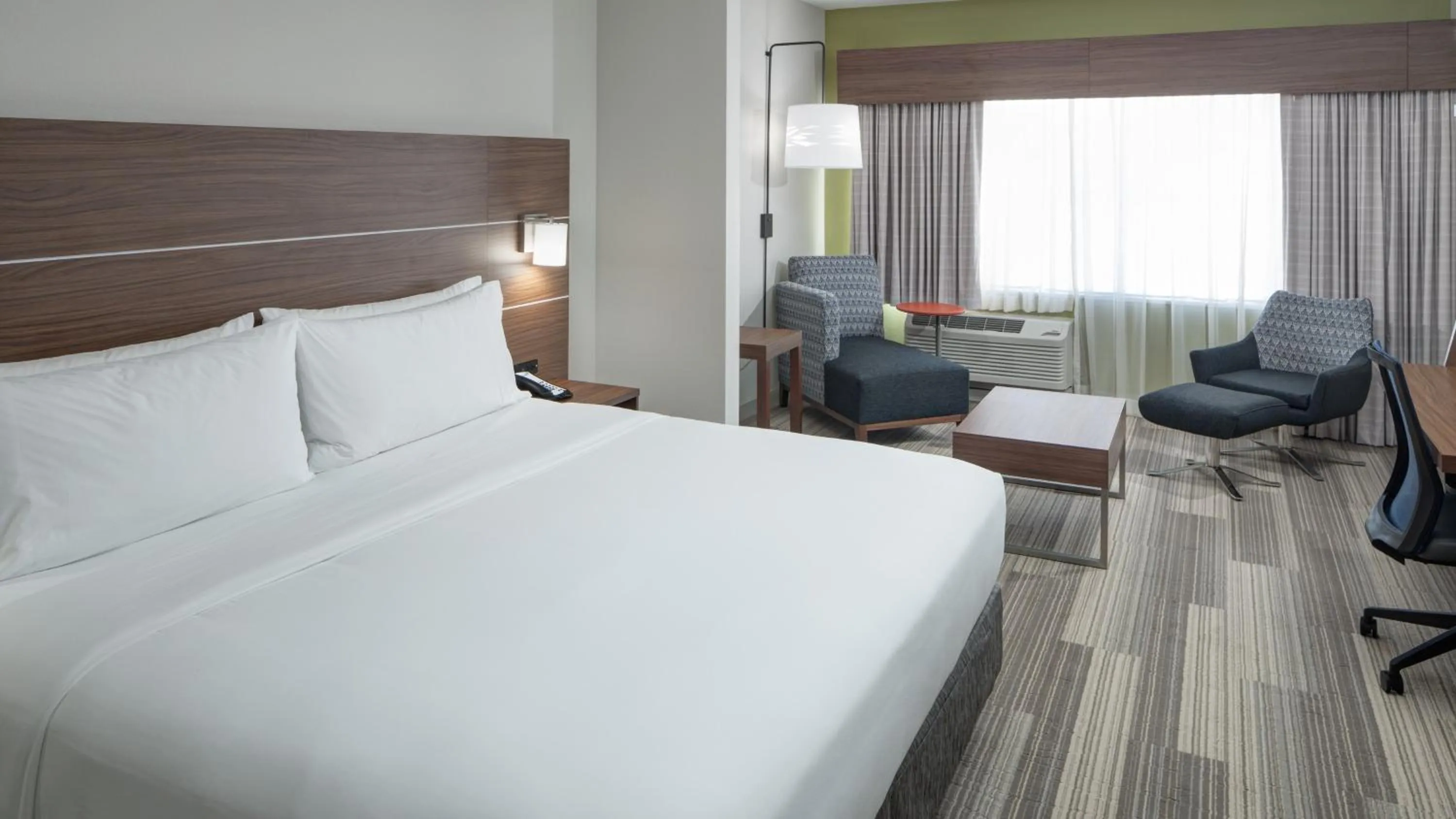 Photo of the whole room, Bed in Holiday Inn Express & Suites Orlando At SeaWorld by IHG - With Free Shuttle Service to SeaWorld Parks