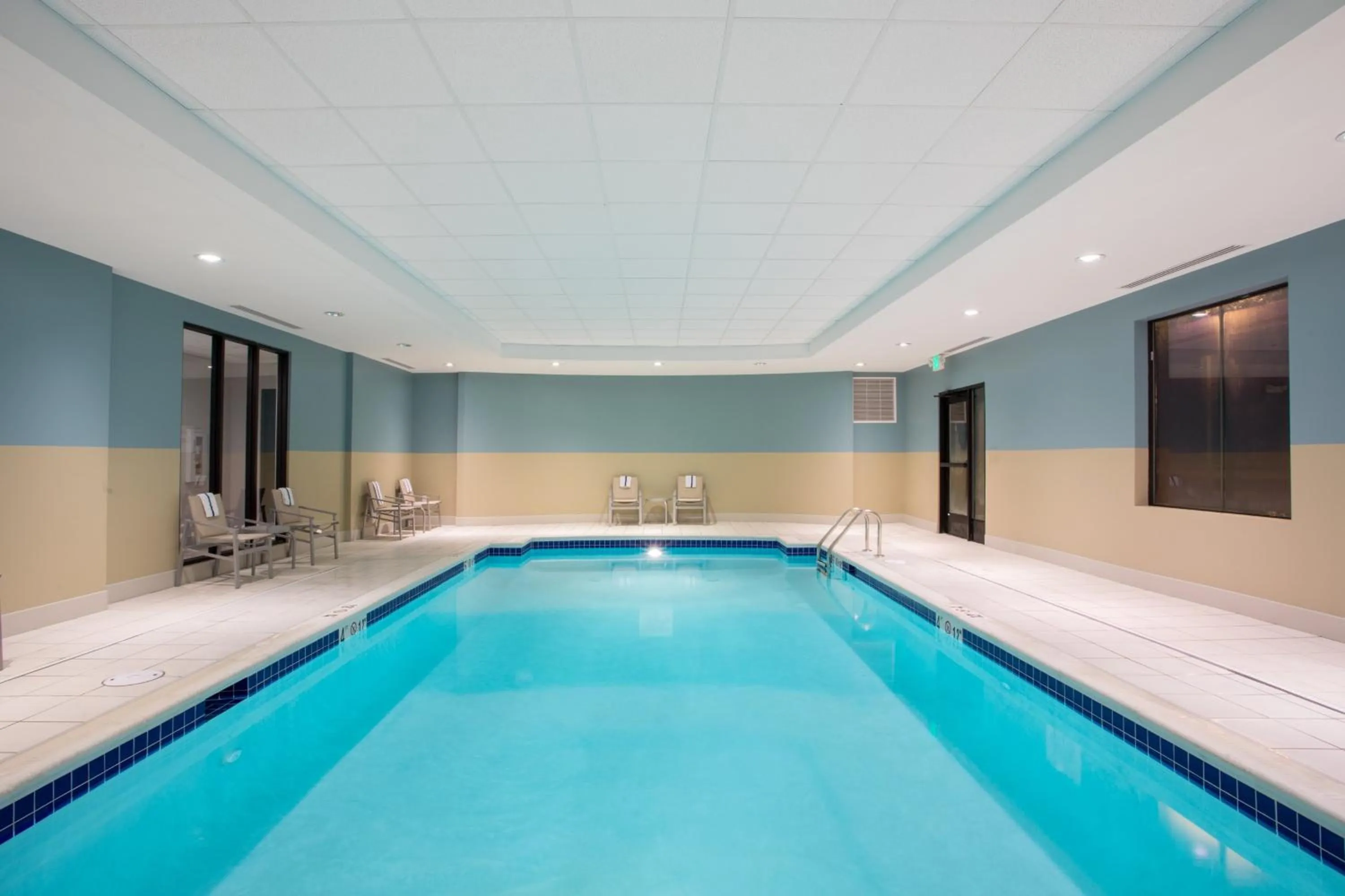 Swimming pool in Holiday Inn Express & Suites Owings Mills-Baltimore Area by IHG