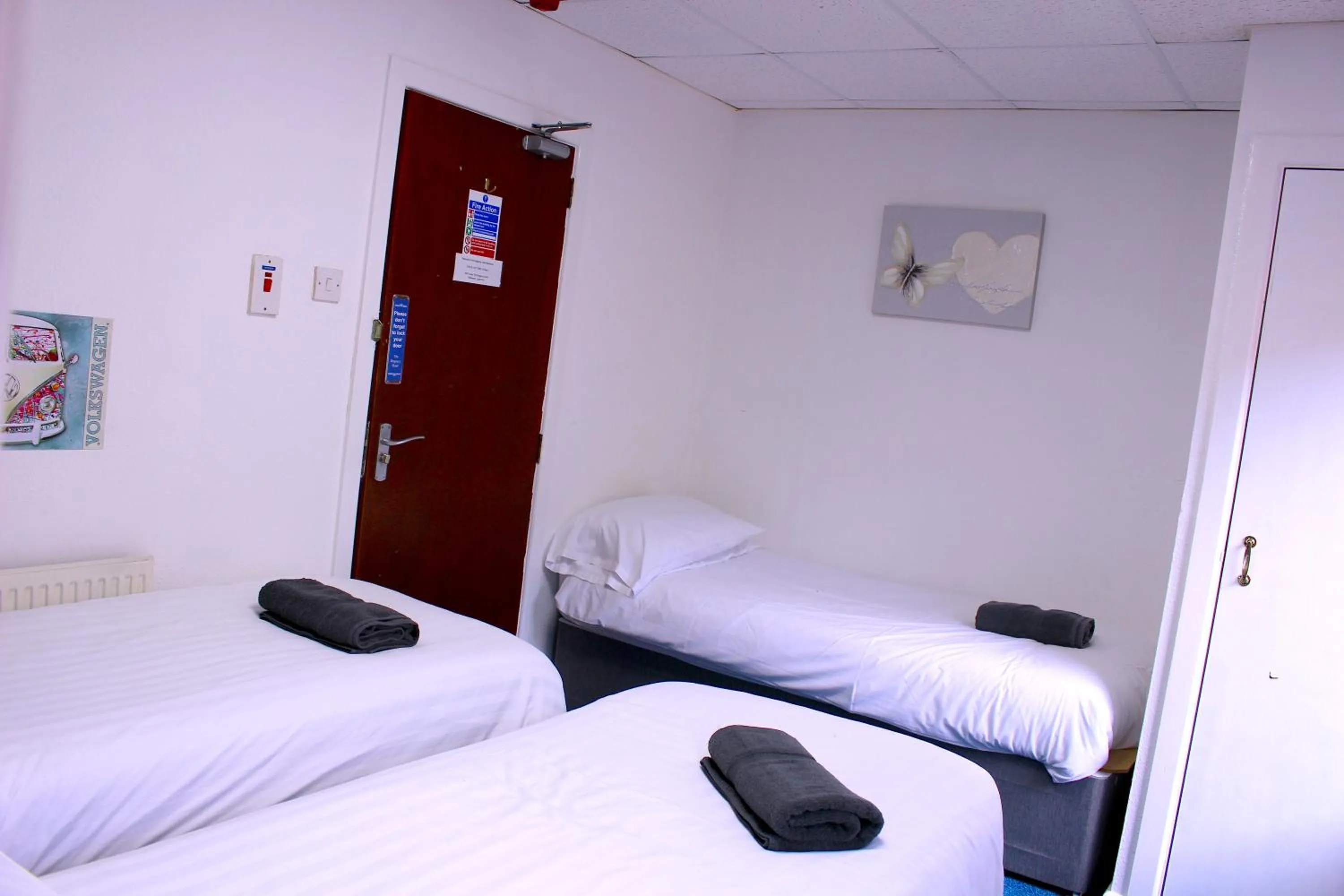 Photo of the whole room, Bed in The Regency Hotel