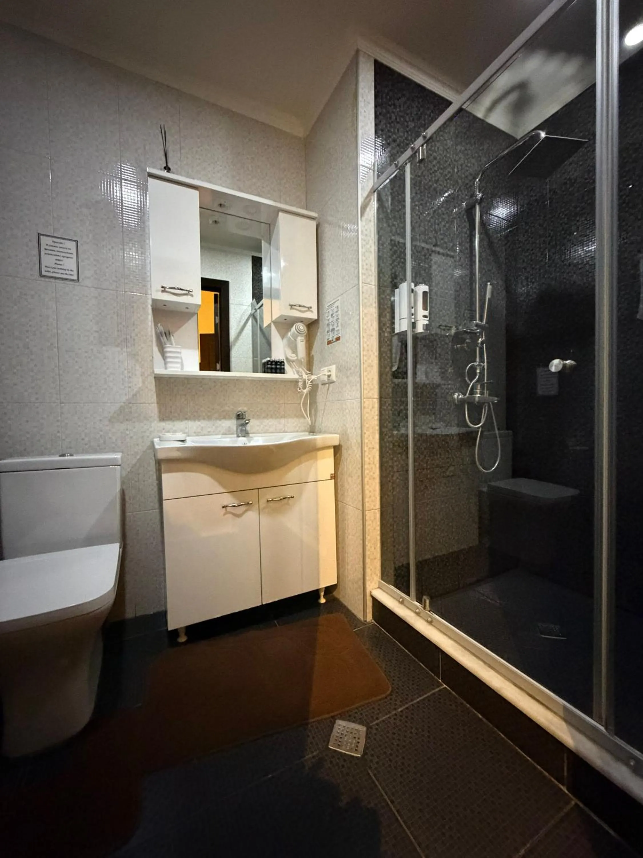 Shower in S&L Boutique Hotel