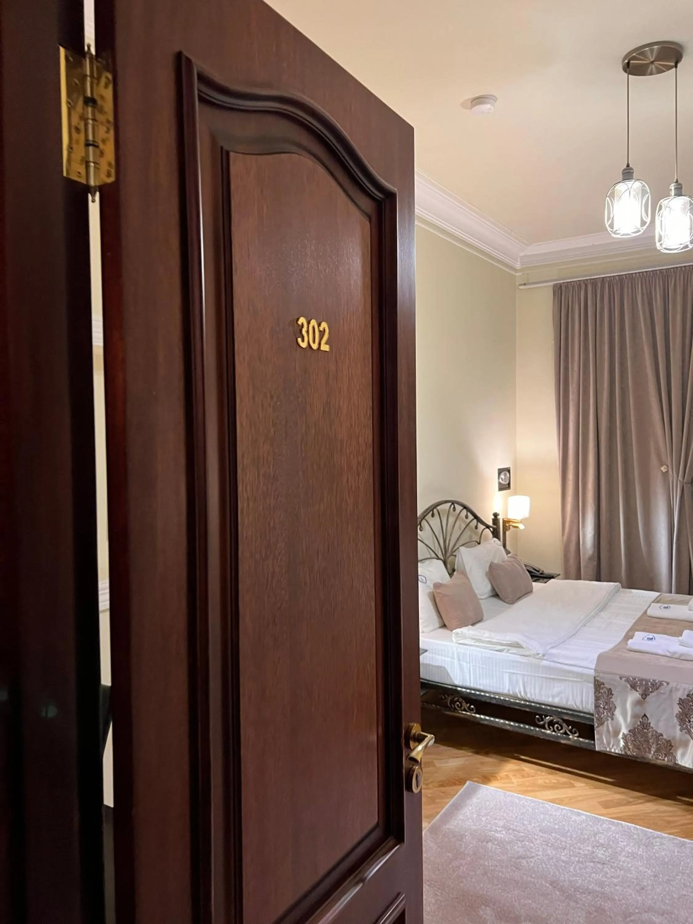 Photo of the whole room, Bed in S&L Boutique Hotel