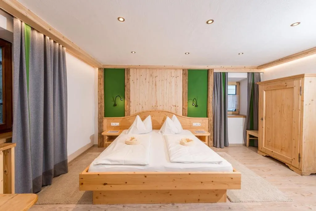 Bed in Das kleine Bio Hotel Tiefenbach