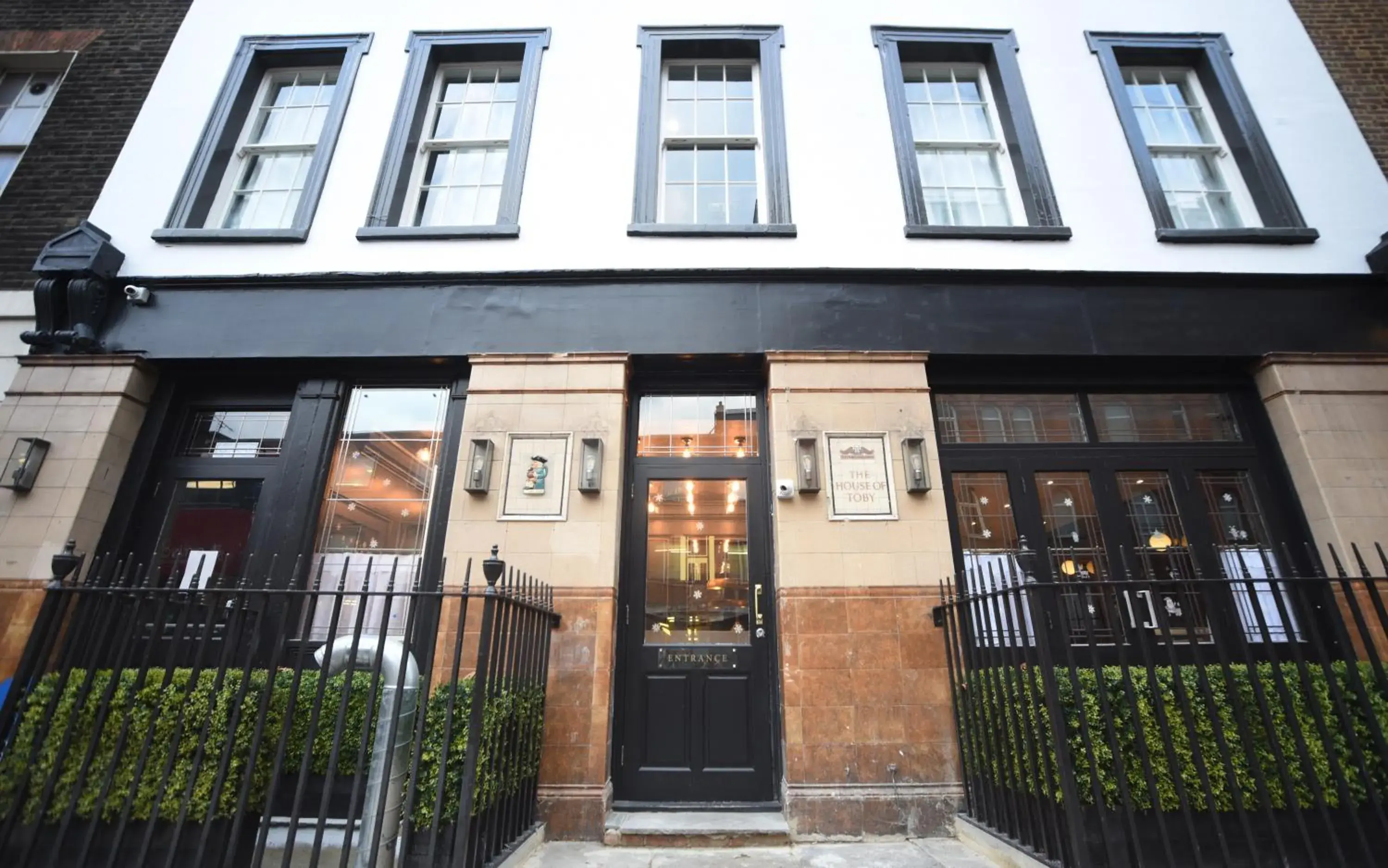 Facade/entrance in The House of Toby Facade/entrance in The House of Toby