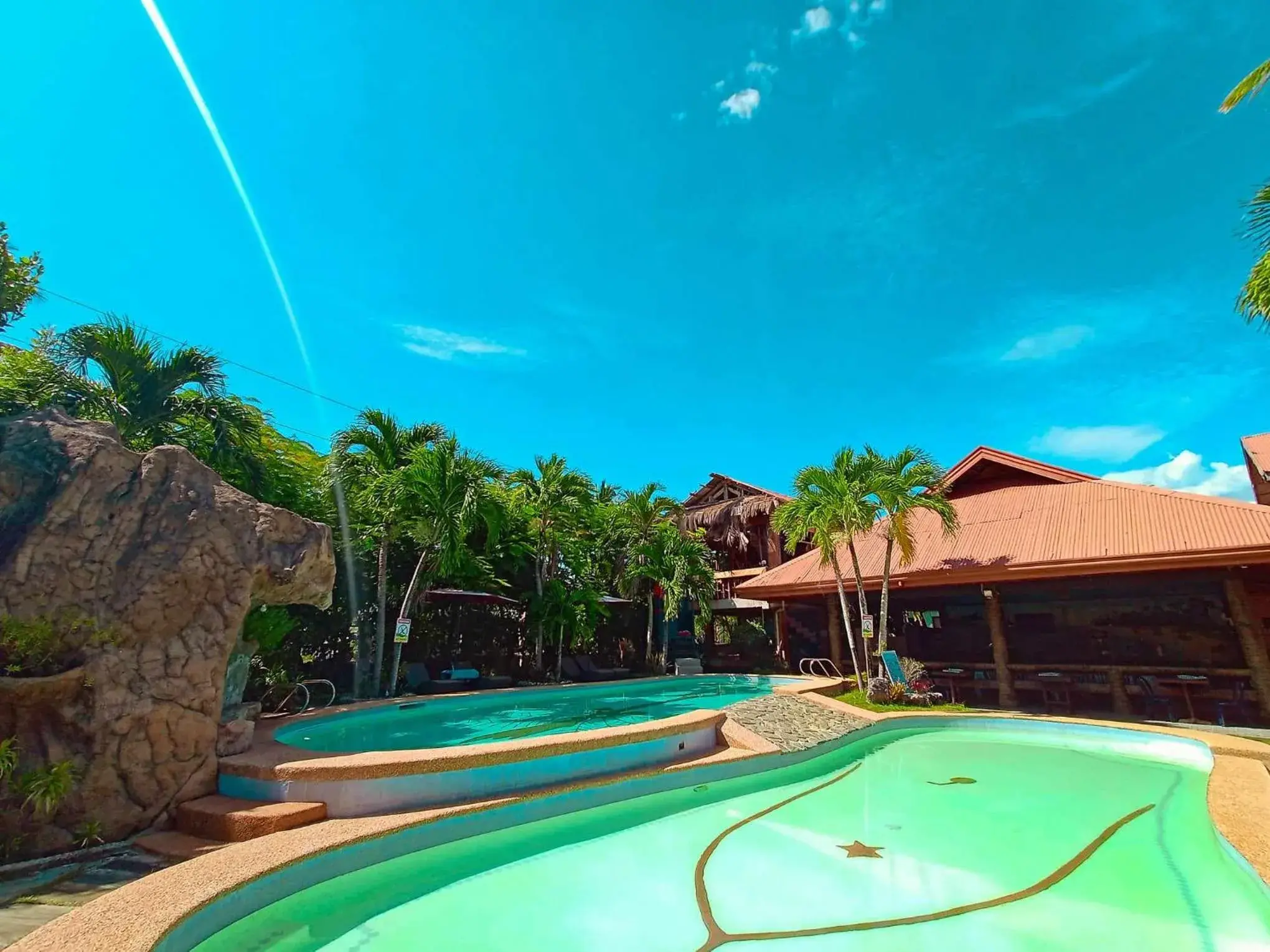 Swimming pool in Coco Grove Nature Resort Swimming pool in Coco Grove Nature Resort