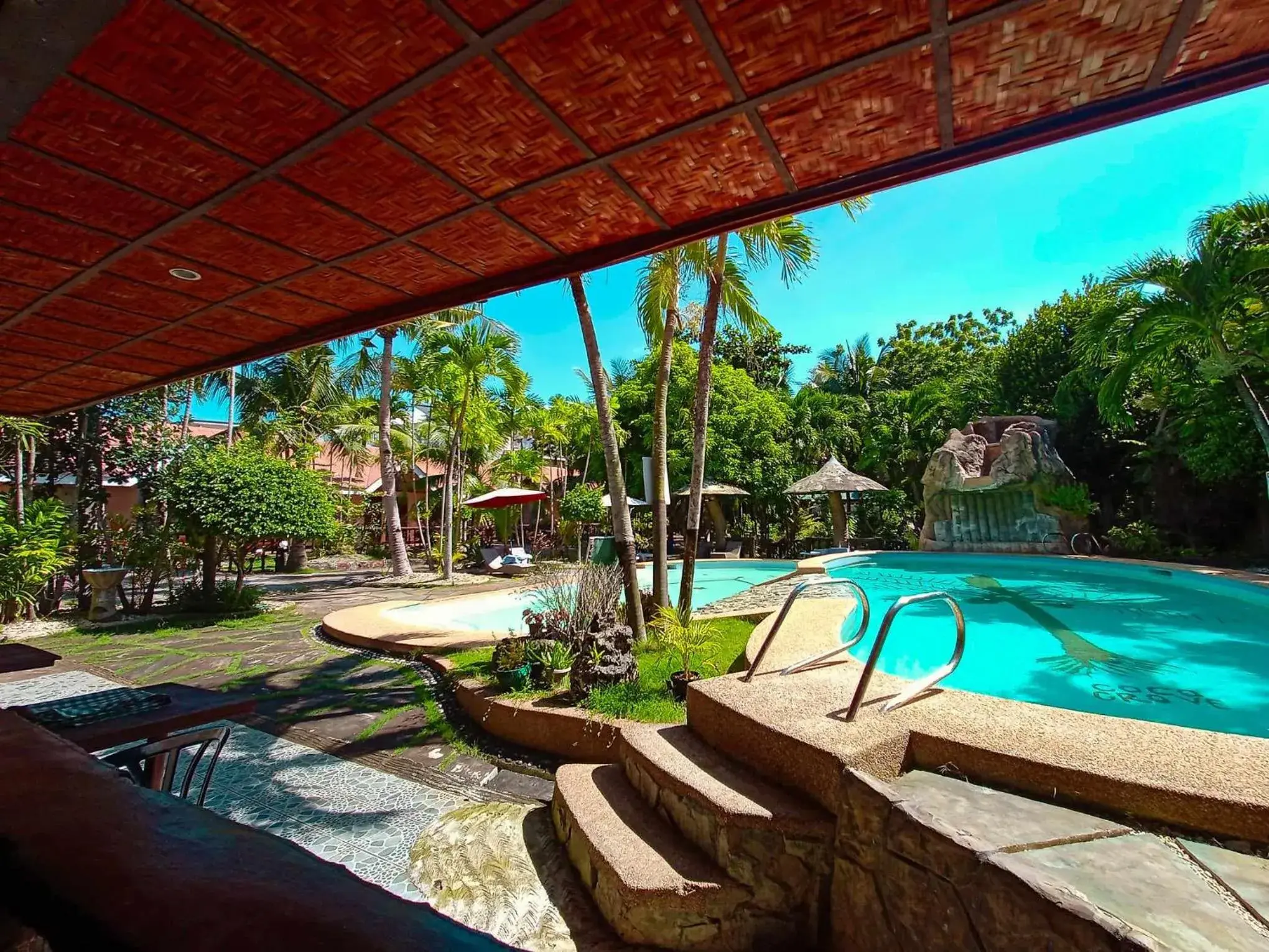 Pool view in Coco Grove Nature Resort Pool view in Coco Grove Nature Resort
