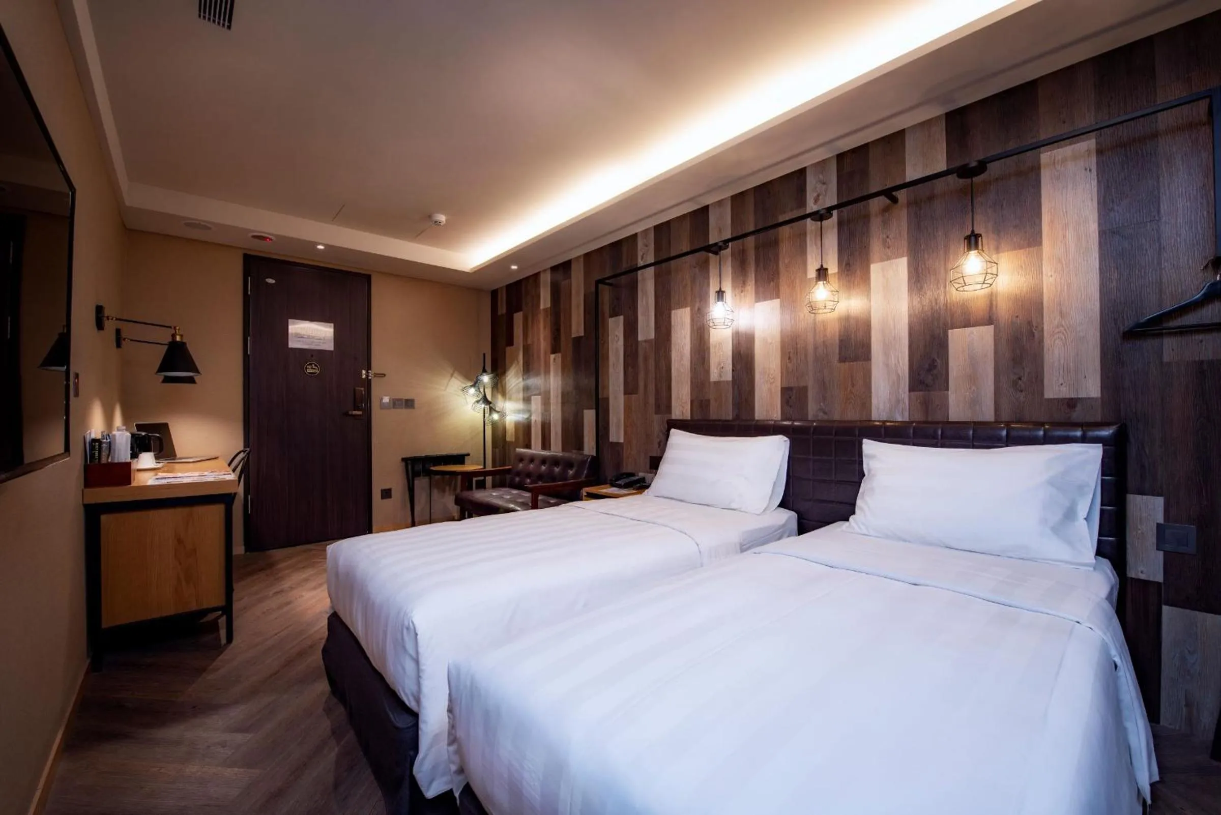 Photo of the whole room, Bed in City Suites - Beimen