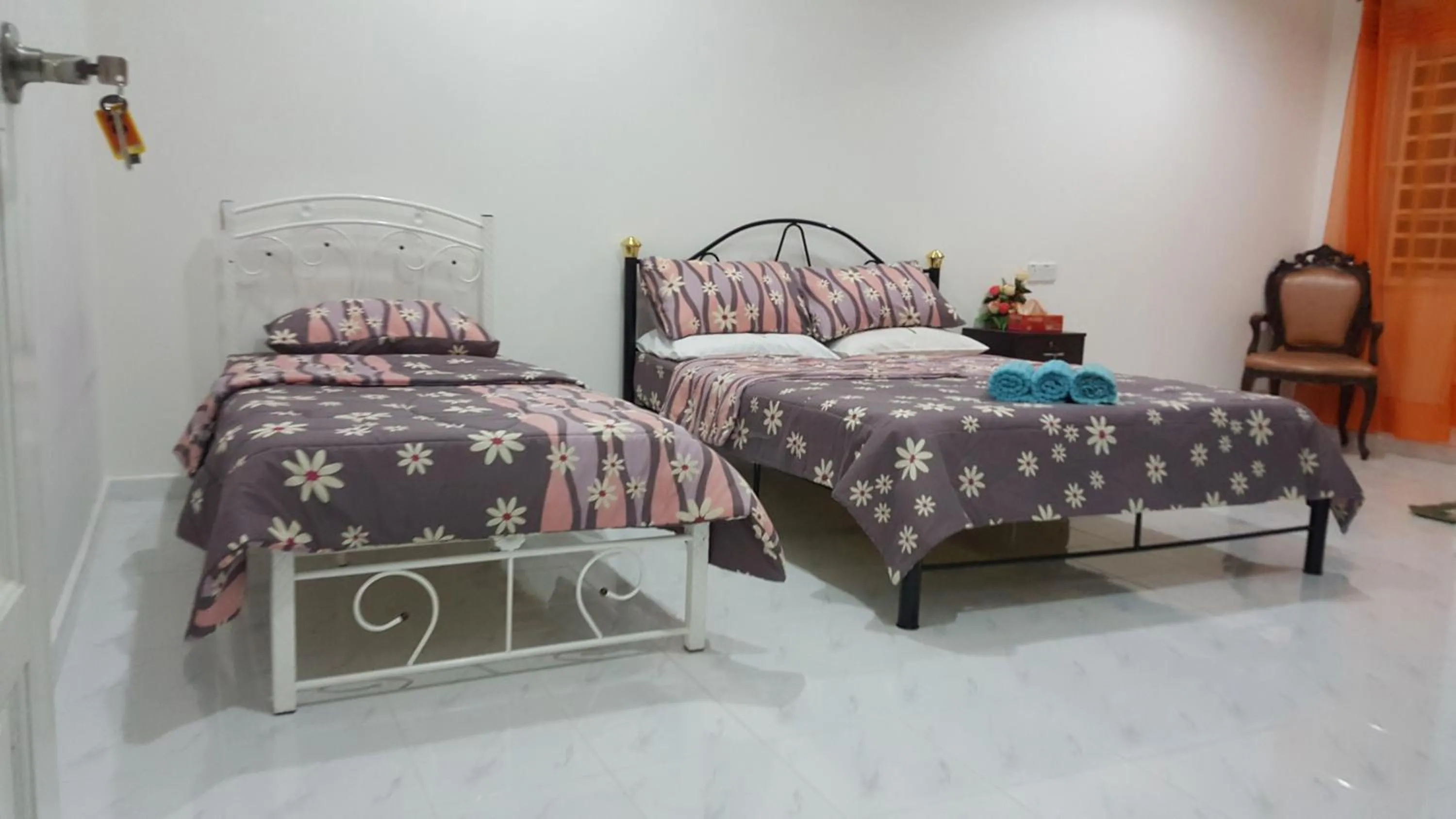 Bed in Mama Iman Guestroom