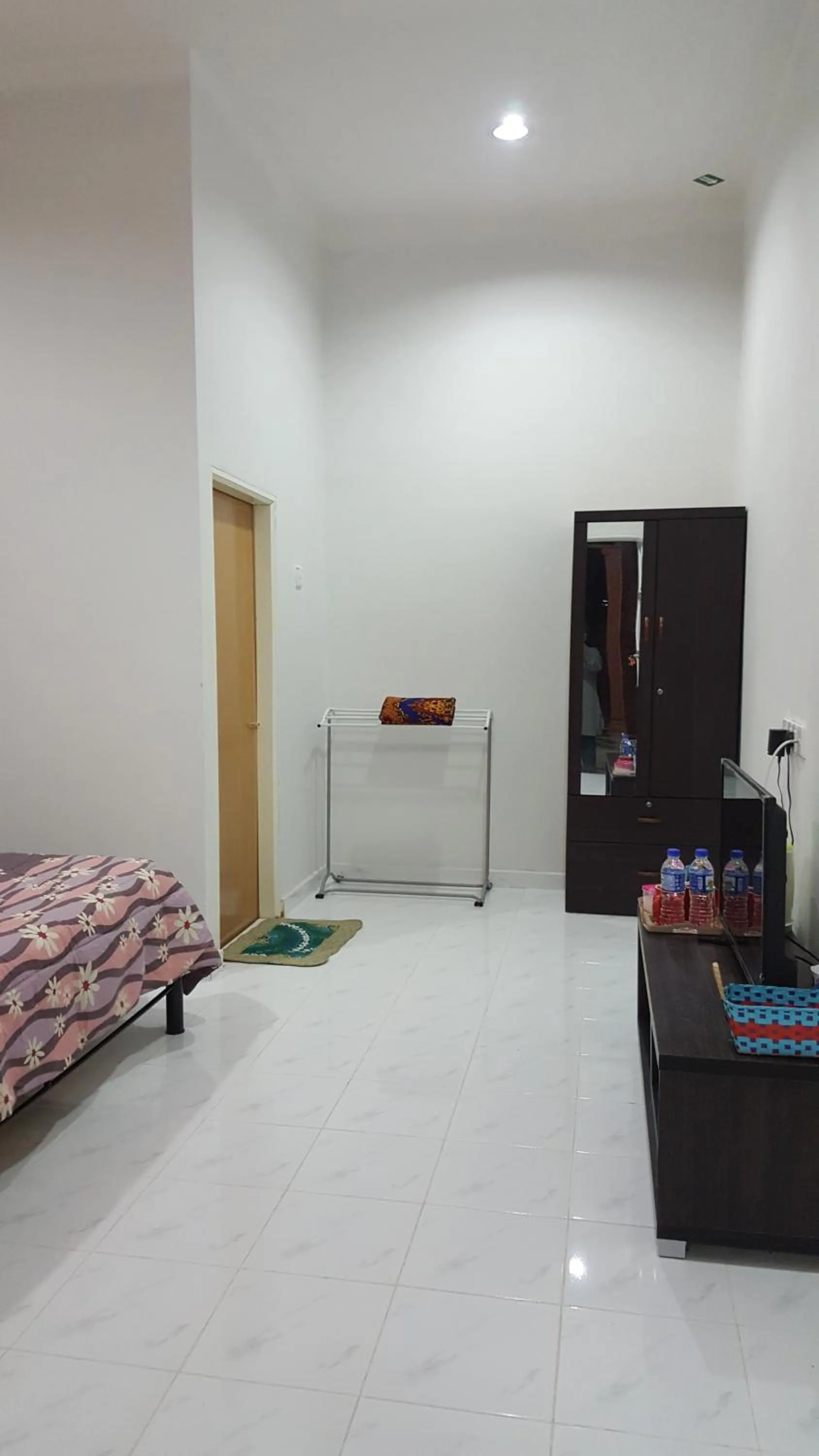 Bed in Mama Iman Guestroom