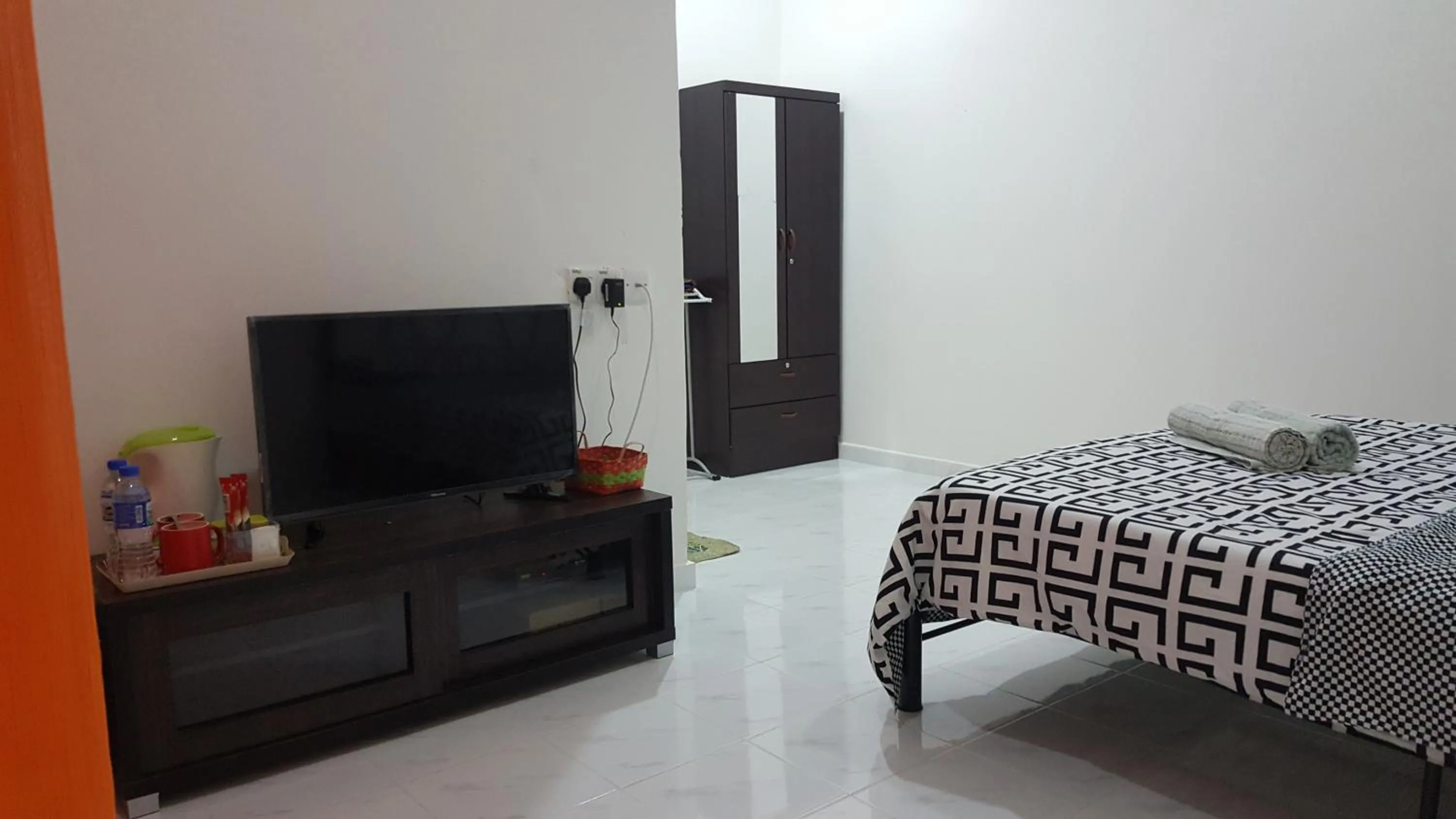 Bed in Mama Iman Guestroom