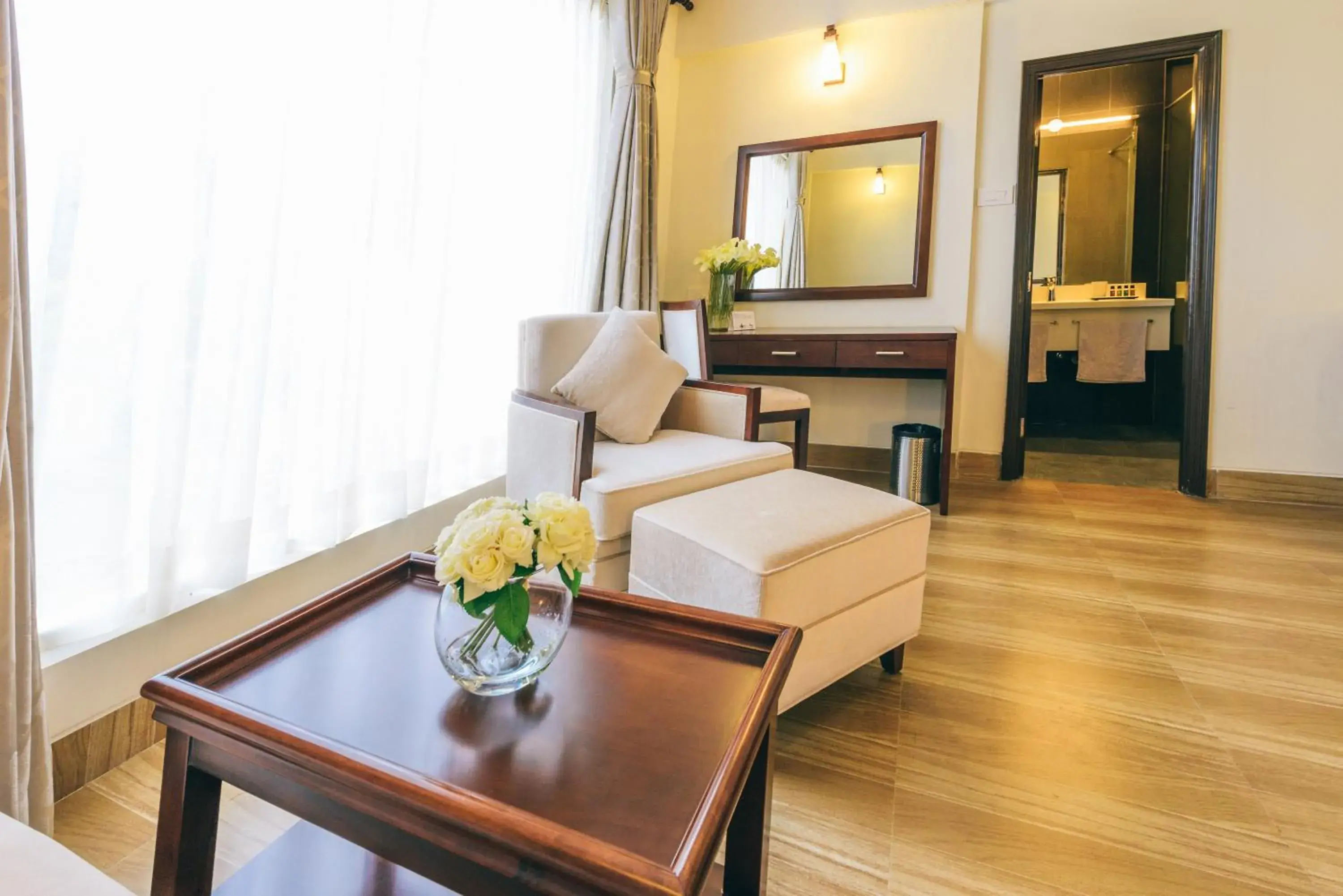 Seating area, Bed in The Greenfields Resort and Convention Seating area, Bed in The Greenfields Resort and Convention