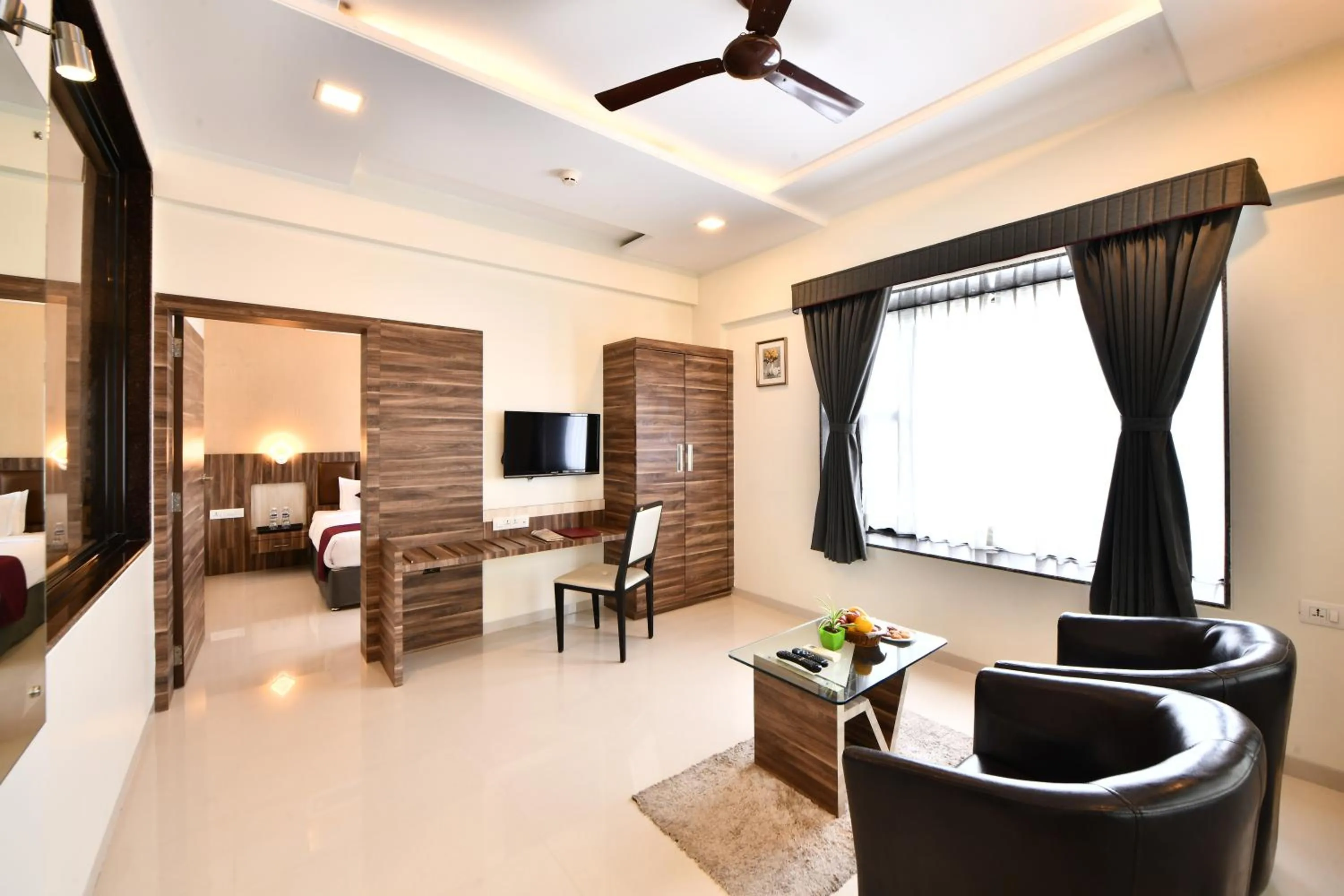 Living room, Bed in Click Hotel Sagar Plaza Chakan, Pune