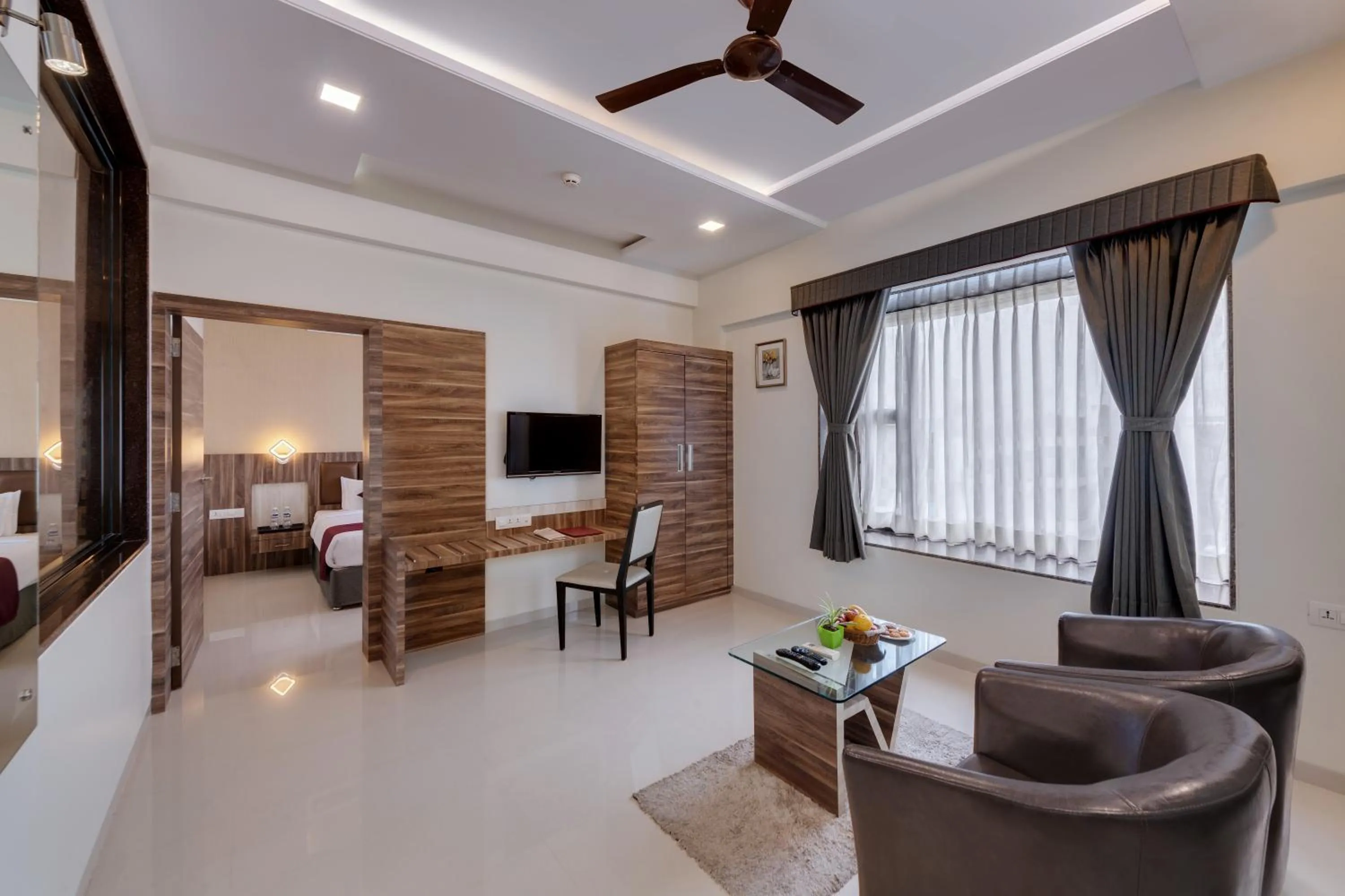 Living room, Bed in Click Hotel Sagar Plaza Chakan, Pune