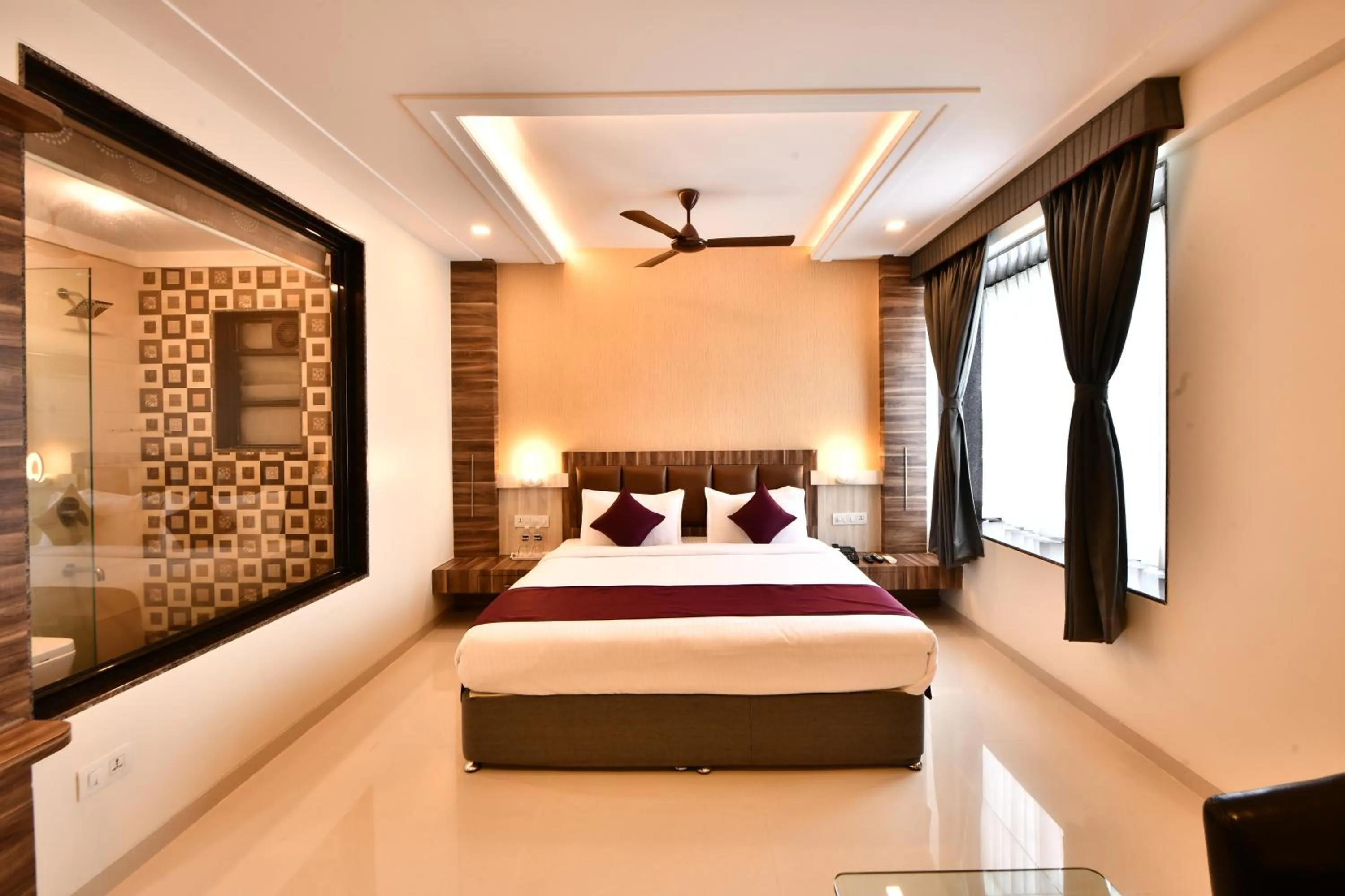 Photo of the whole room, Bed in Click Hotel Sagar Plaza Chakan, Pune