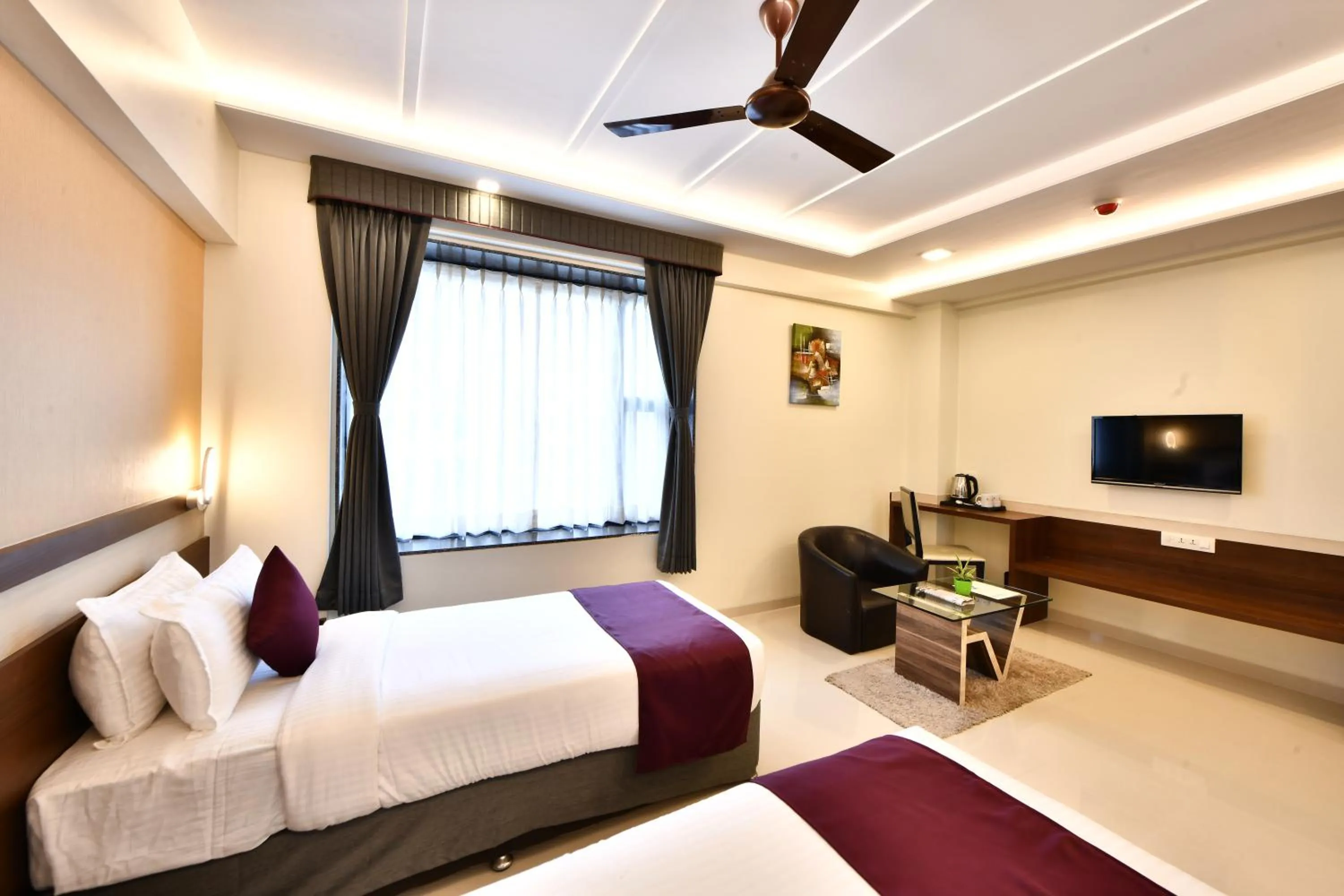 Photo of the whole room, Bed in Click Hotel Sagar Plaza Chakan, Pune
