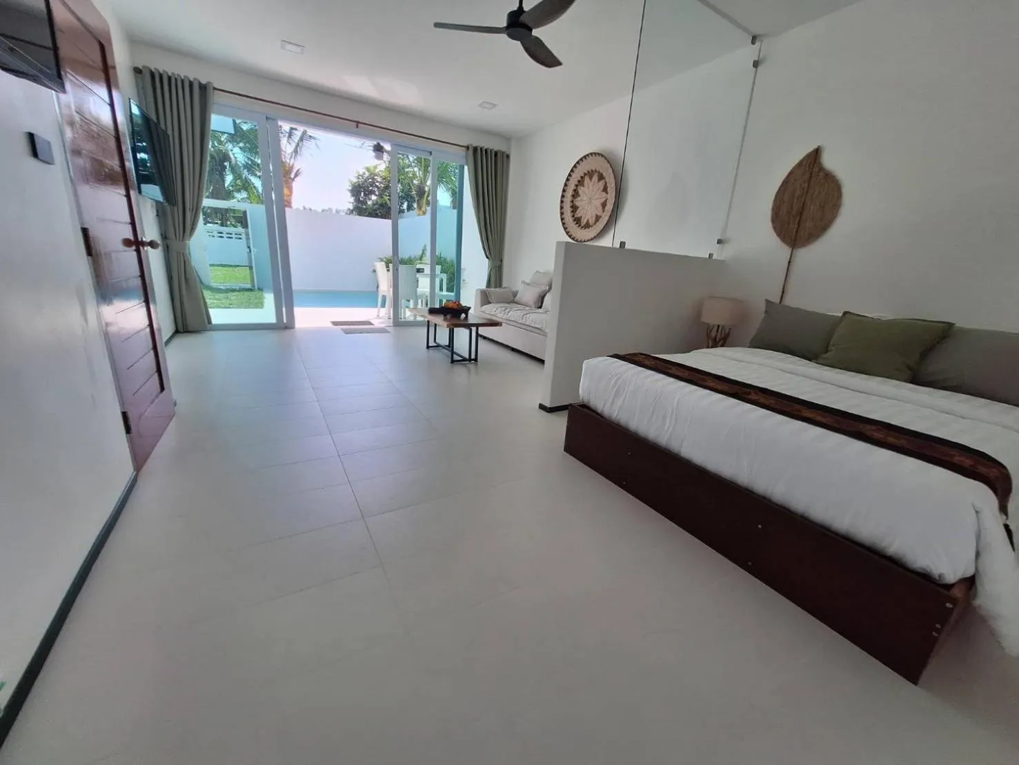 Bed in Lotus Bleu Resort & Restaurant