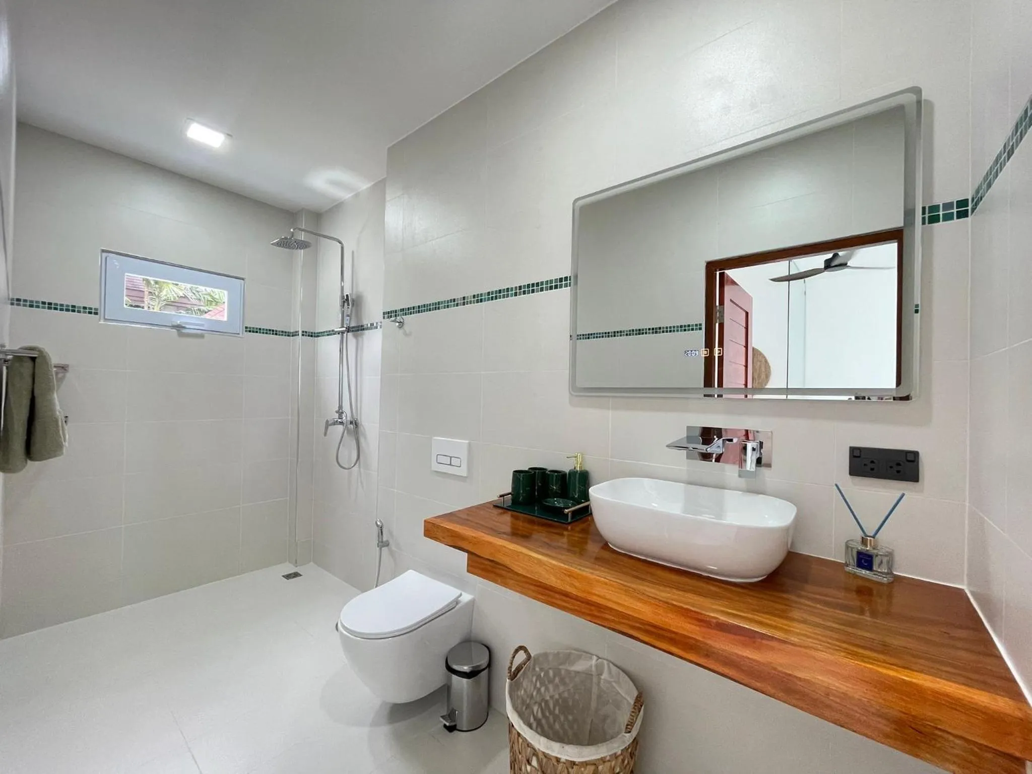 Shower in Lotus Bleu Resort & Restaurant