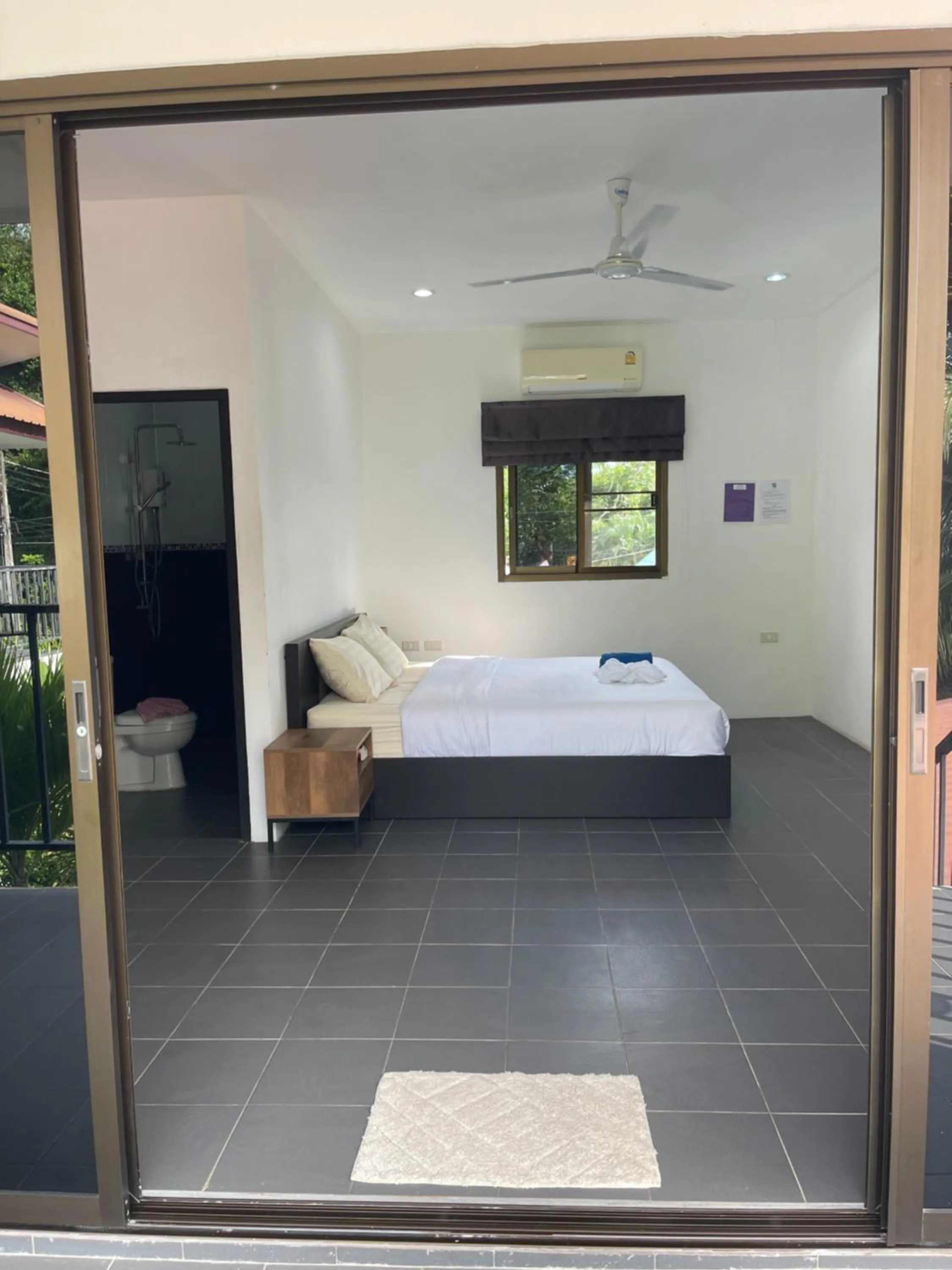 Bed in Lotus Bleu Resort & Restaurant