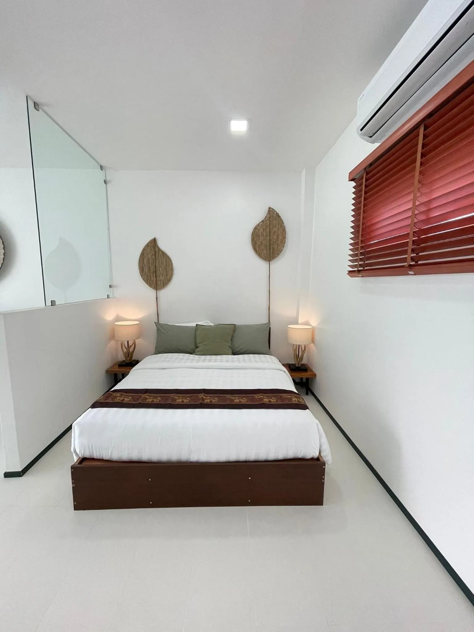 Bed in Lotus Bleu Resort & Restaurant