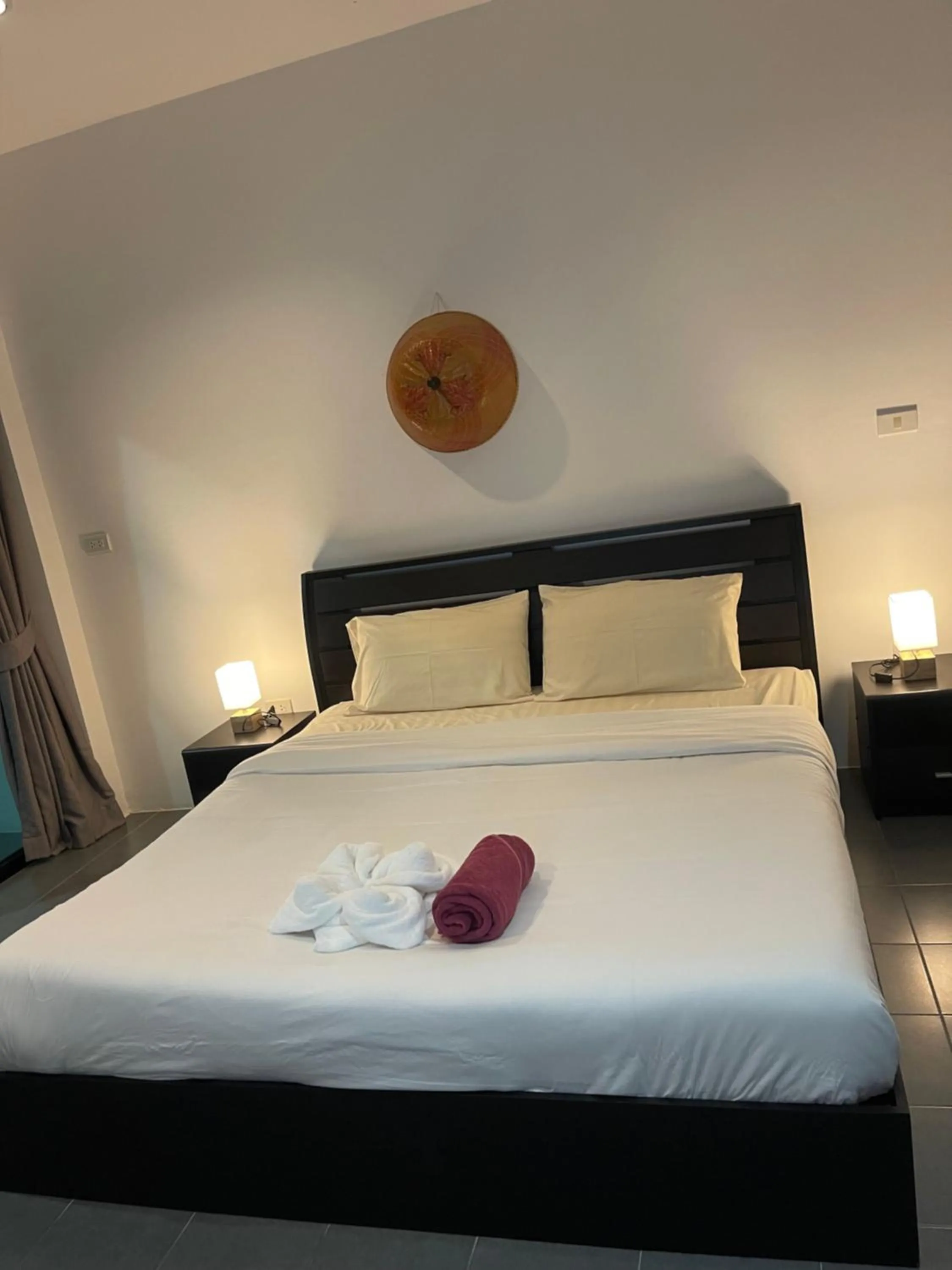 Bed in Lotus Bleu Resort & Restaurant