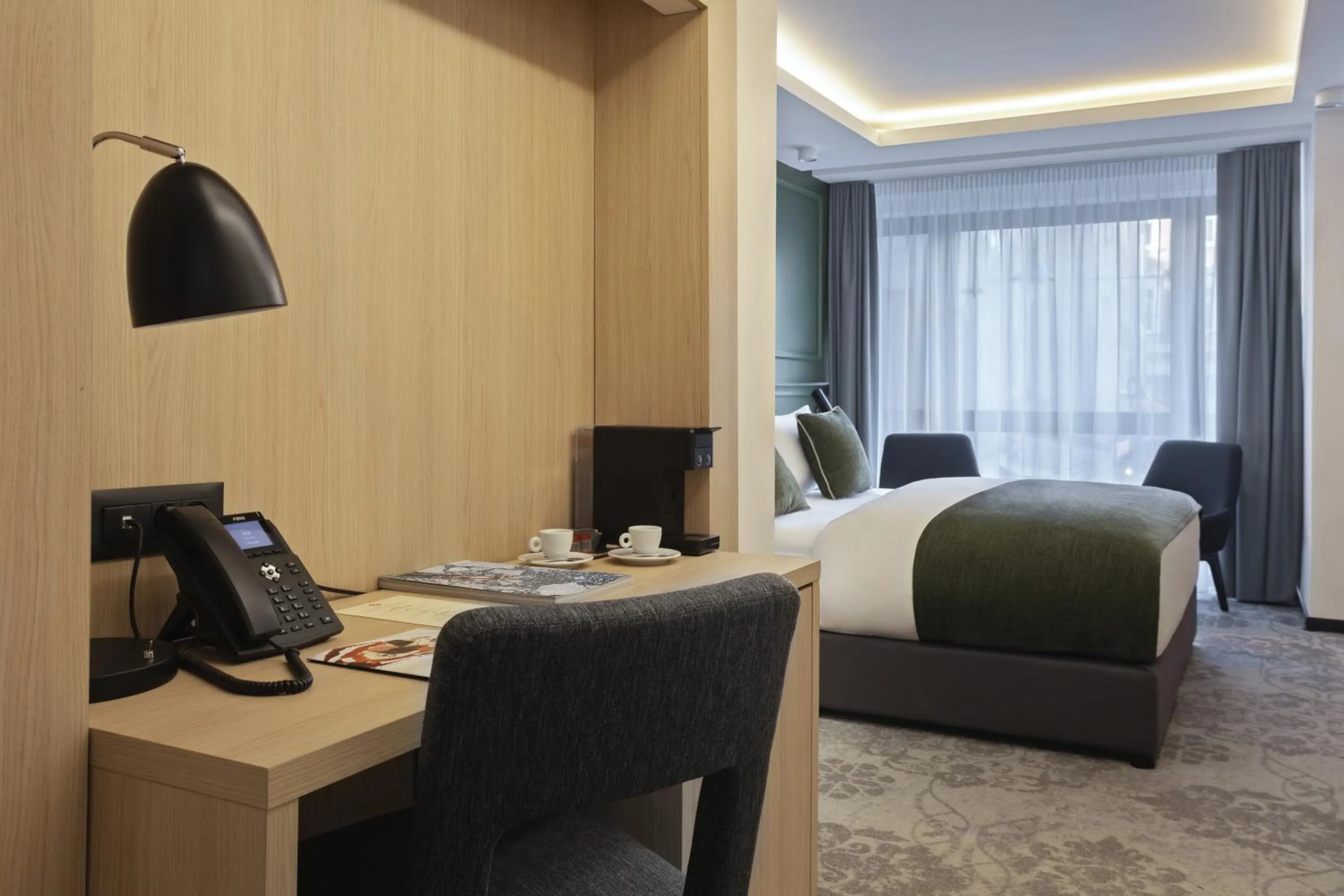 Bed in Apeiro City Avant-garde Hotel