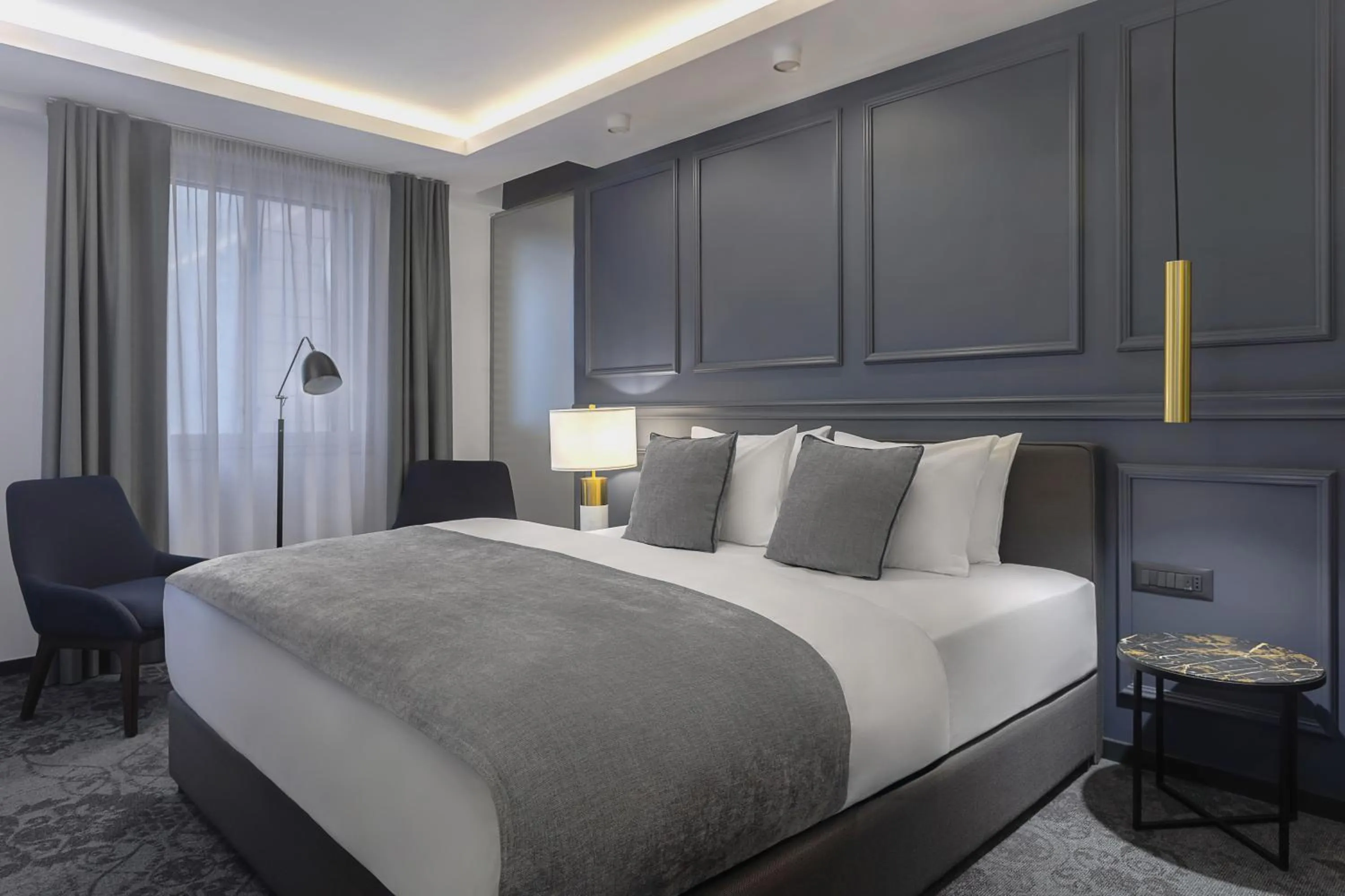 Bed in Apeiro City Avant-garde Hotel