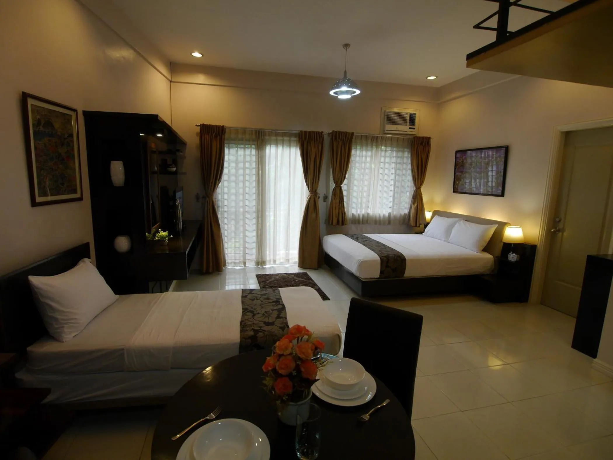 Bed in New Manila Suites