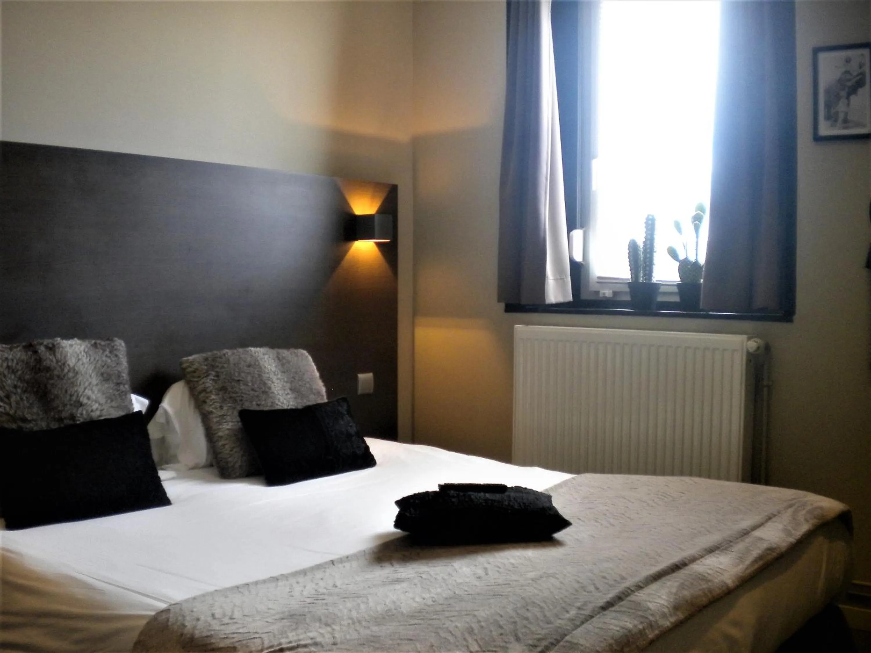 Bed in Be Cottage Hotel