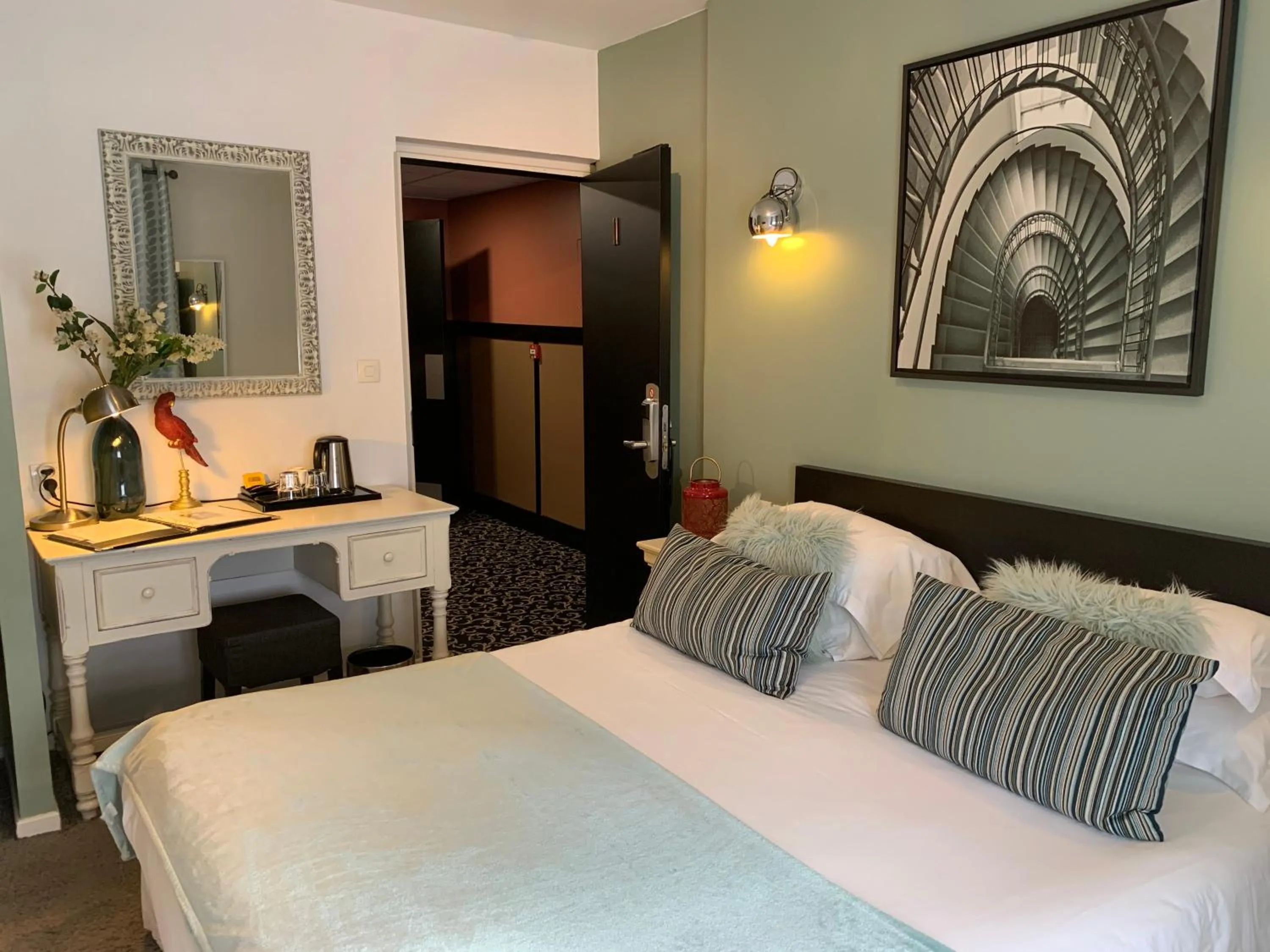 Decorative detail, Bed in Be Cottage Hotel