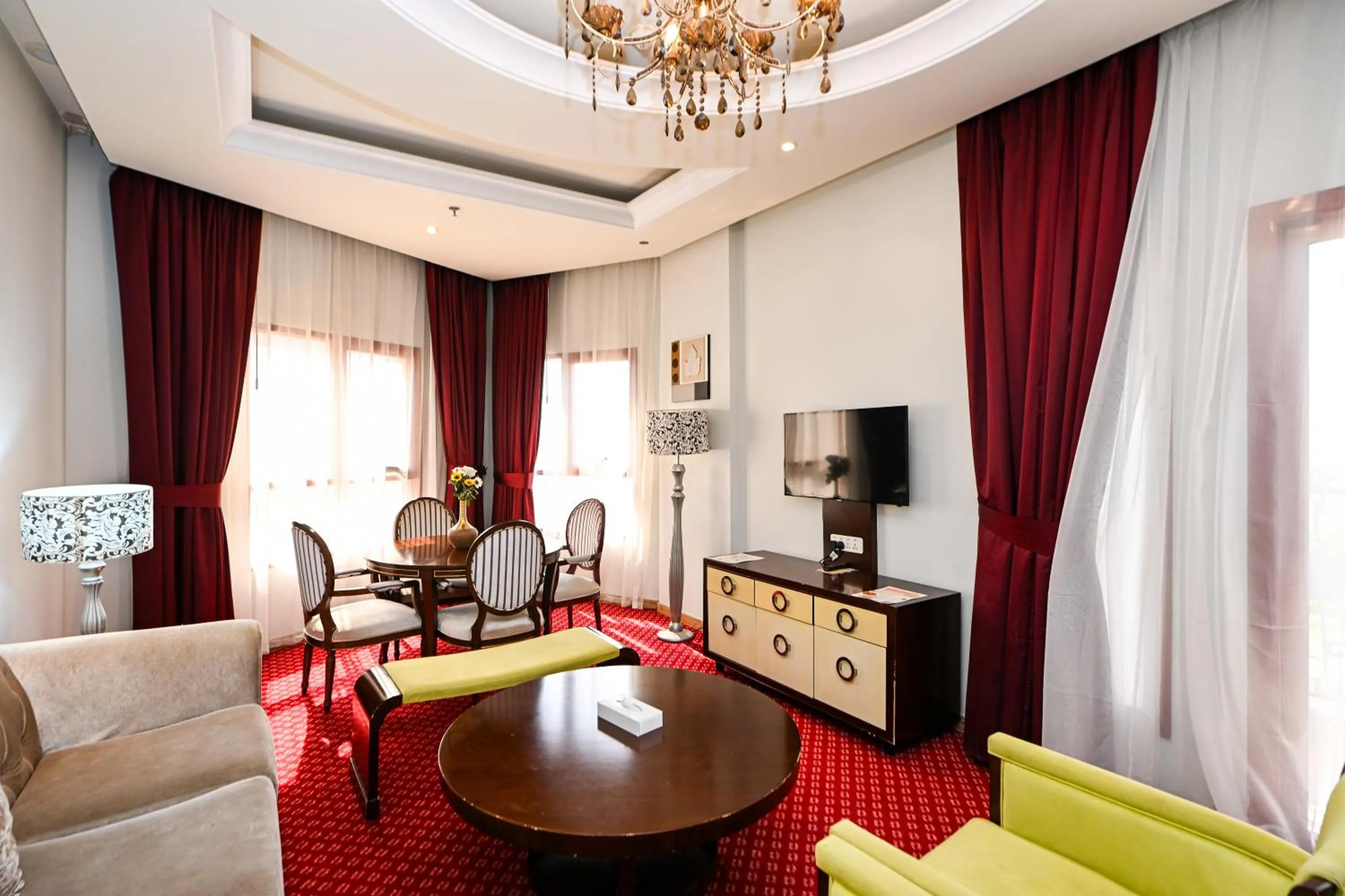 Communal lounge/ TV room in Red Castle Hotel