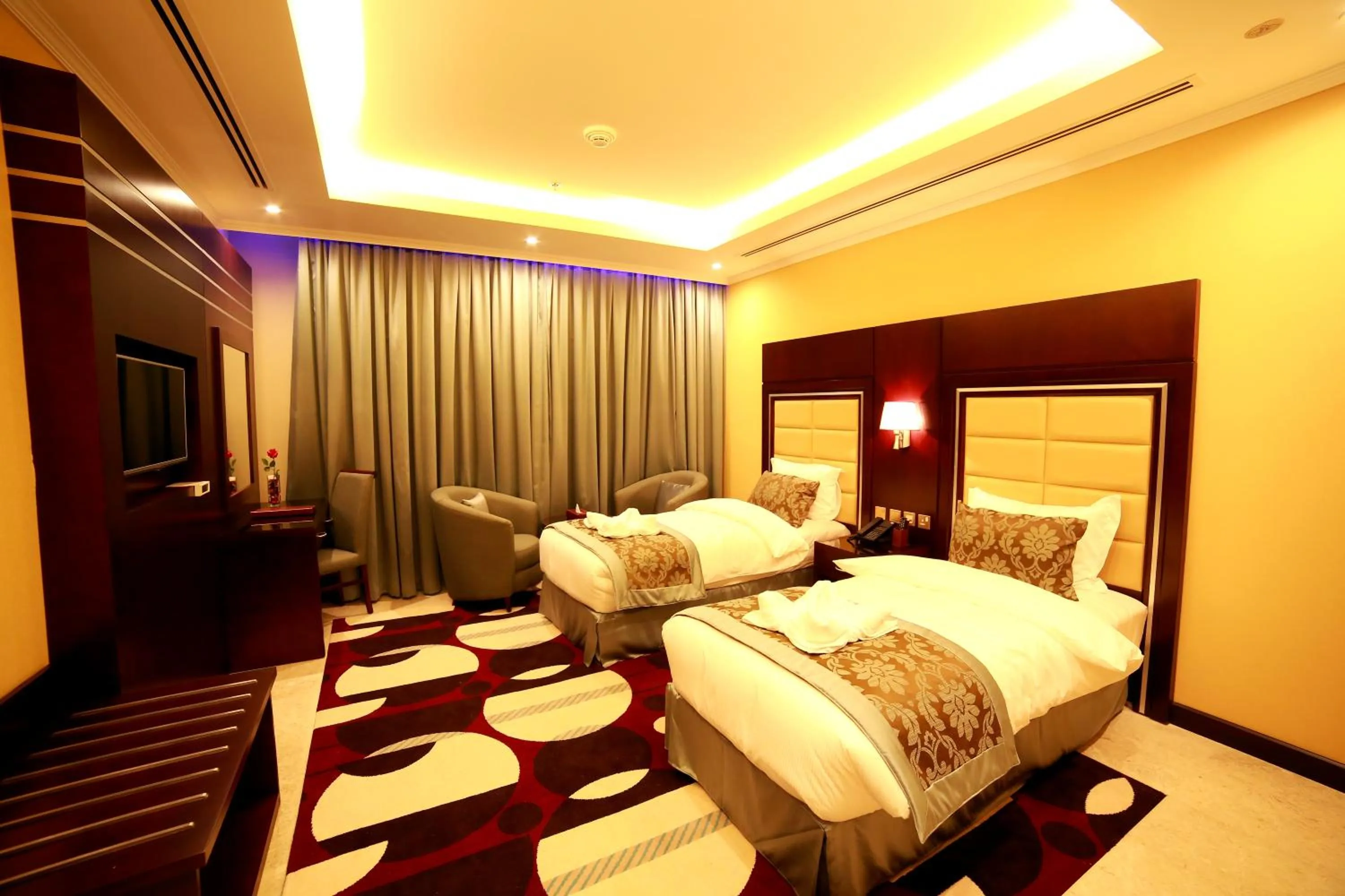 Bed in Telal Hotel Apartments