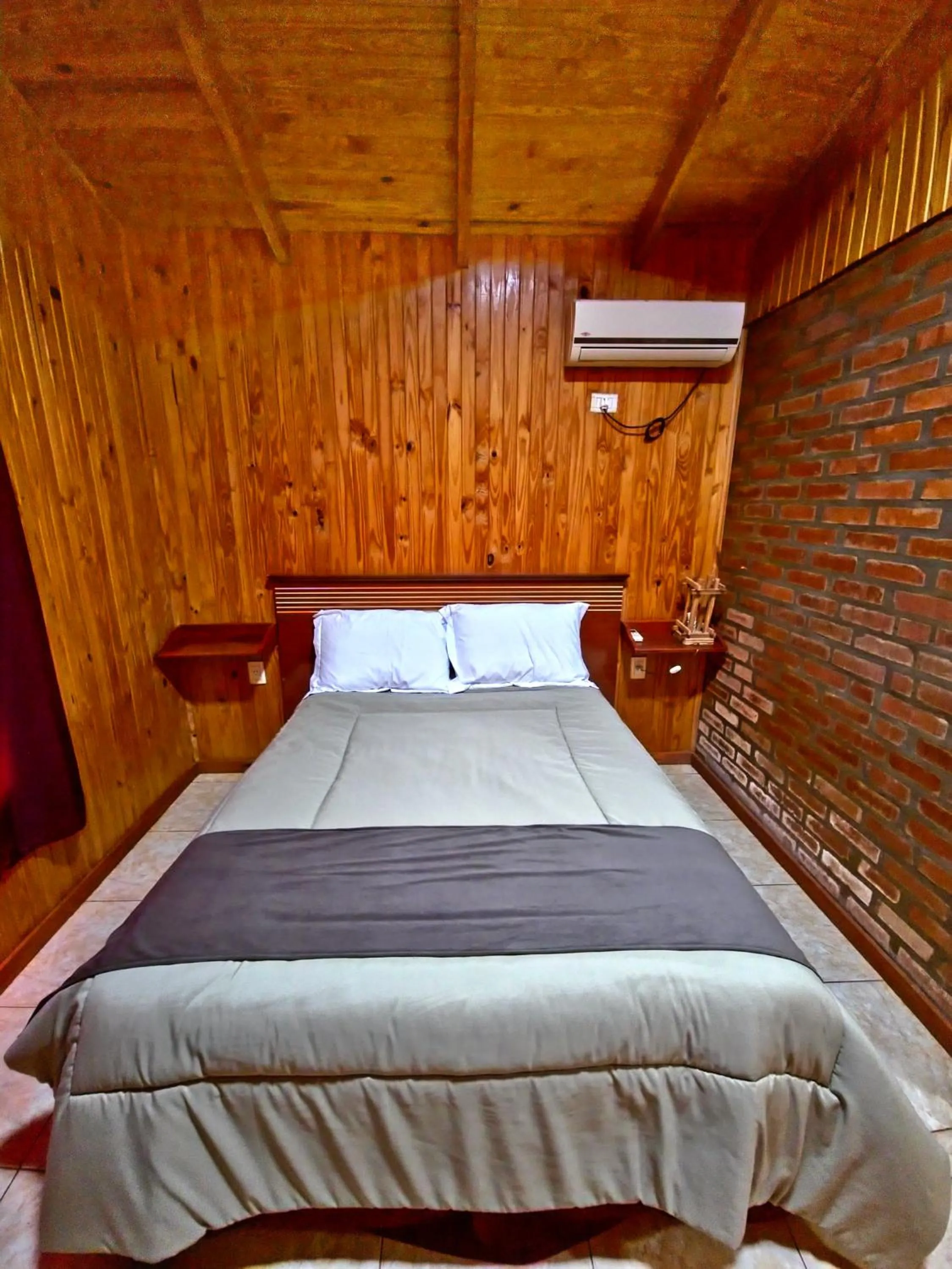 Bed in Terra Iguazú Cabañas