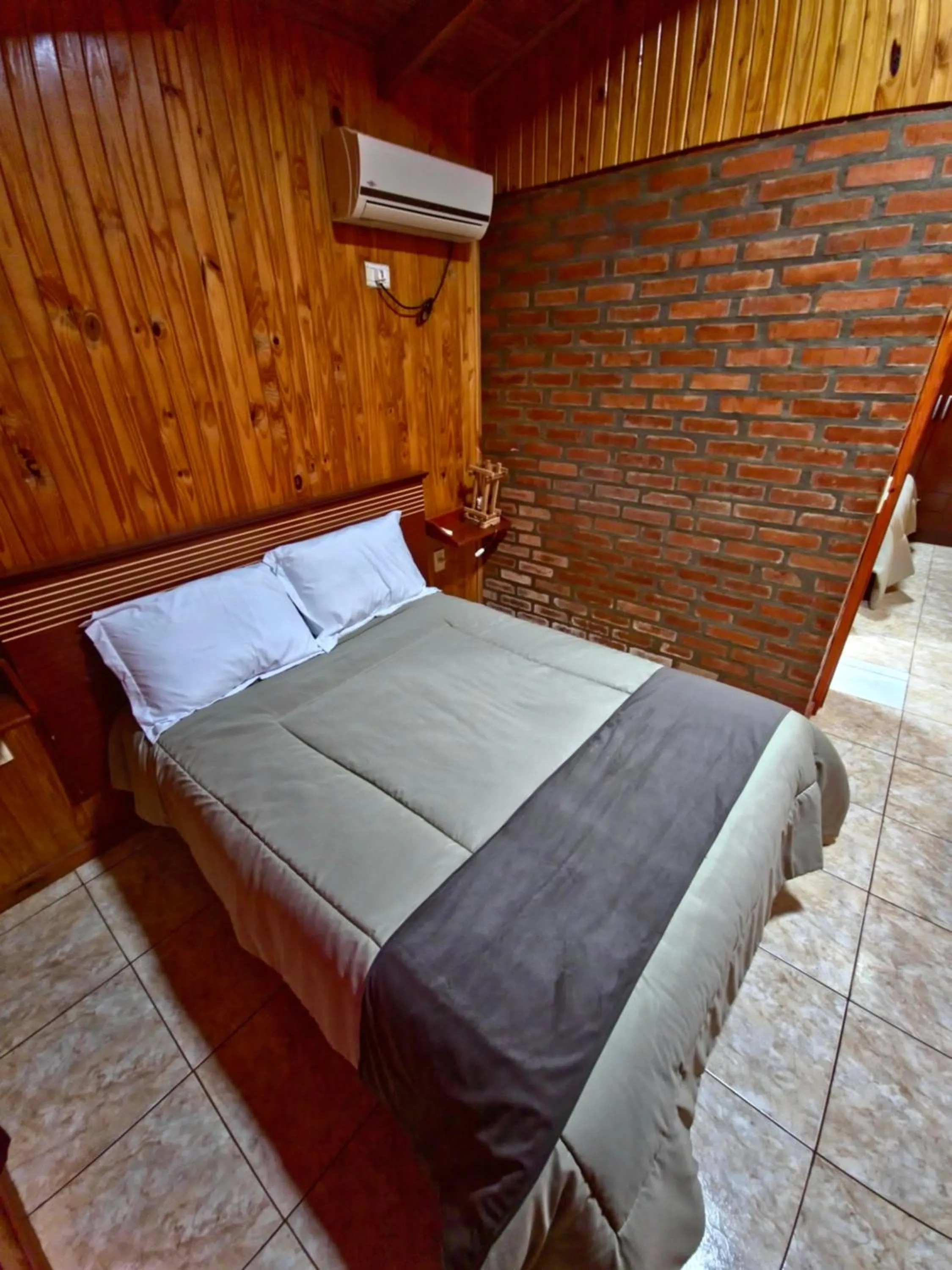 Bed in Terra Iguazú Cabañas