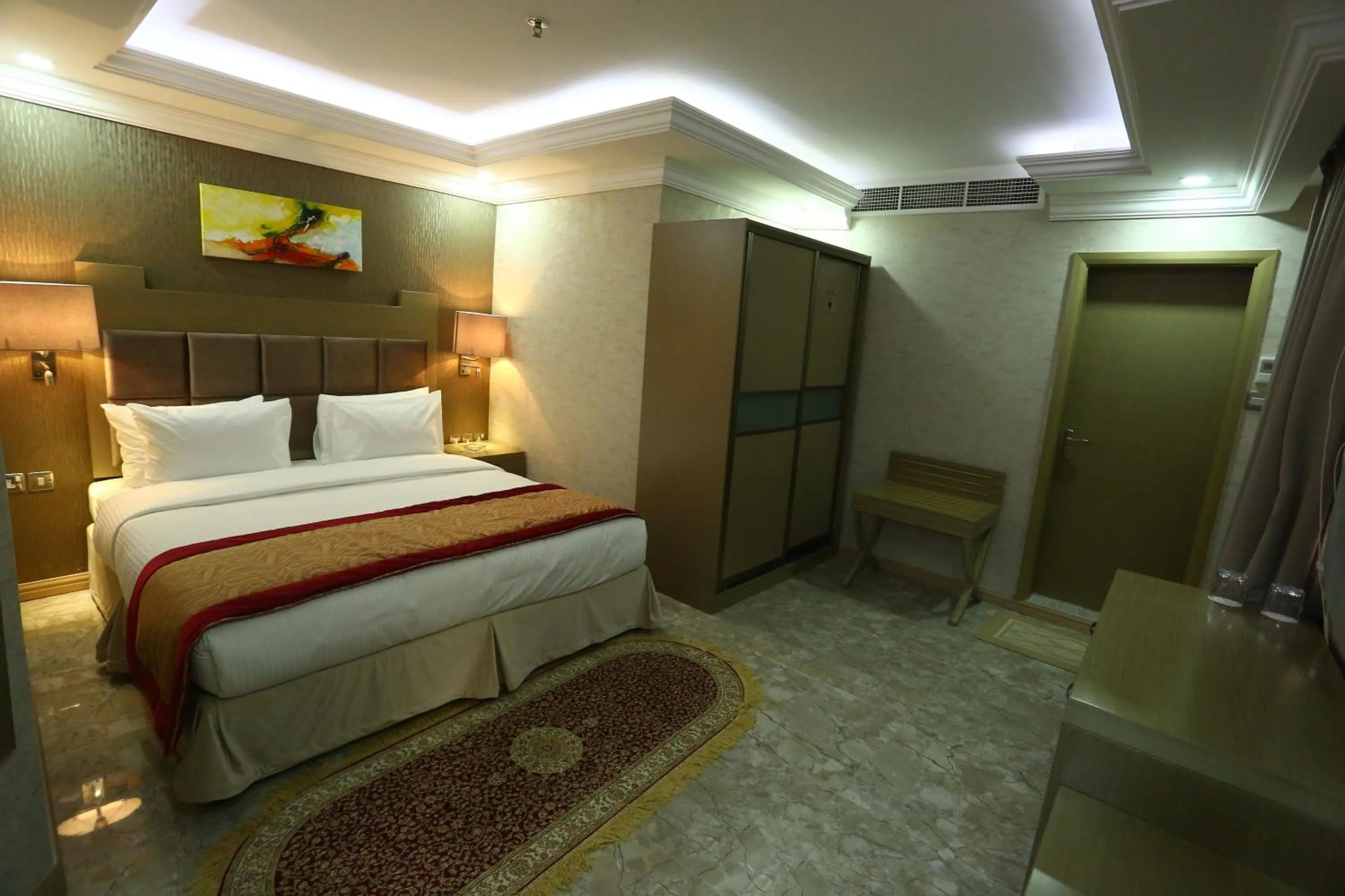 Photo of the whole room, Bed in Sun and Sands Plaza Hotel