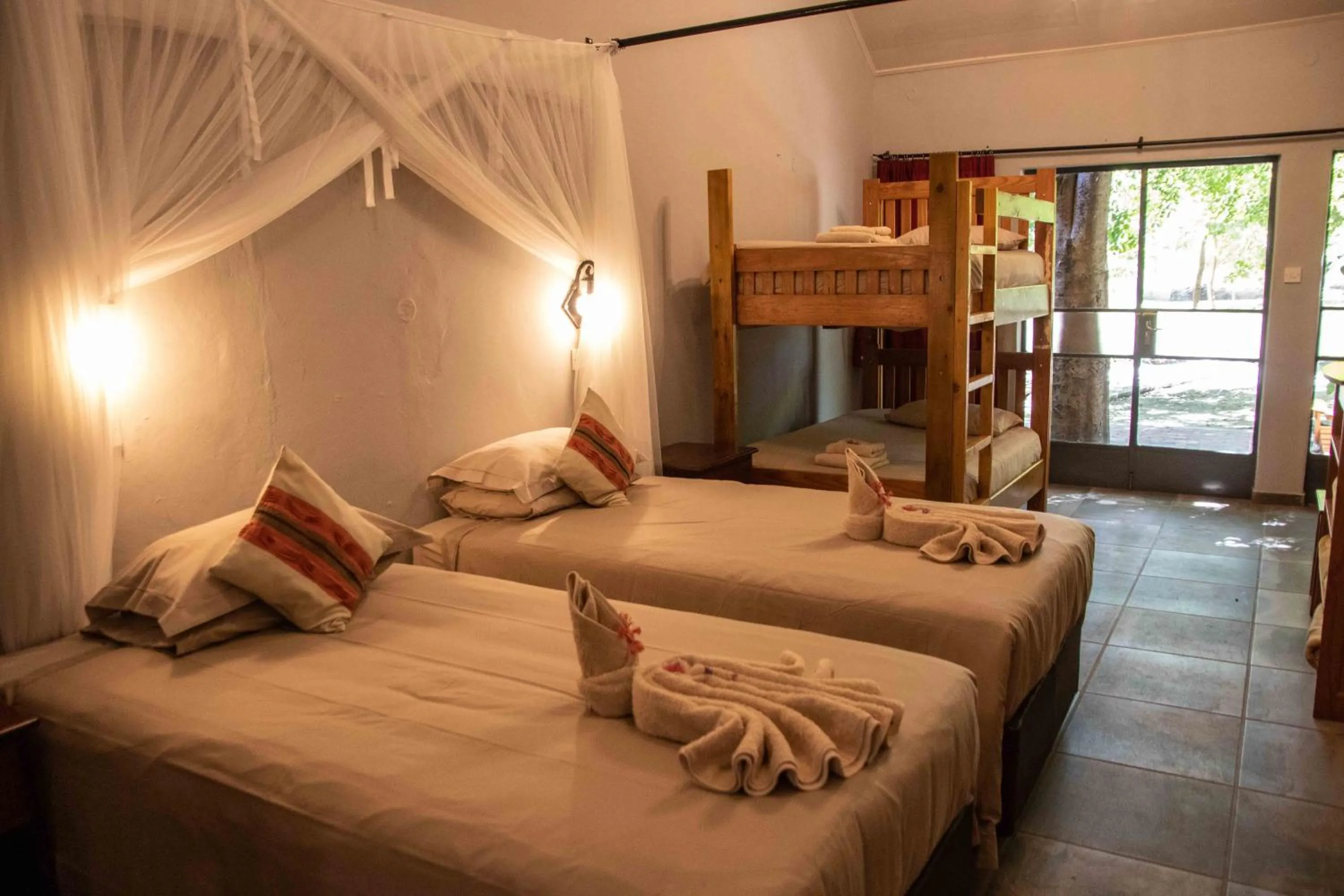 Photo of the whole room, Bed in Island Safari Lodge