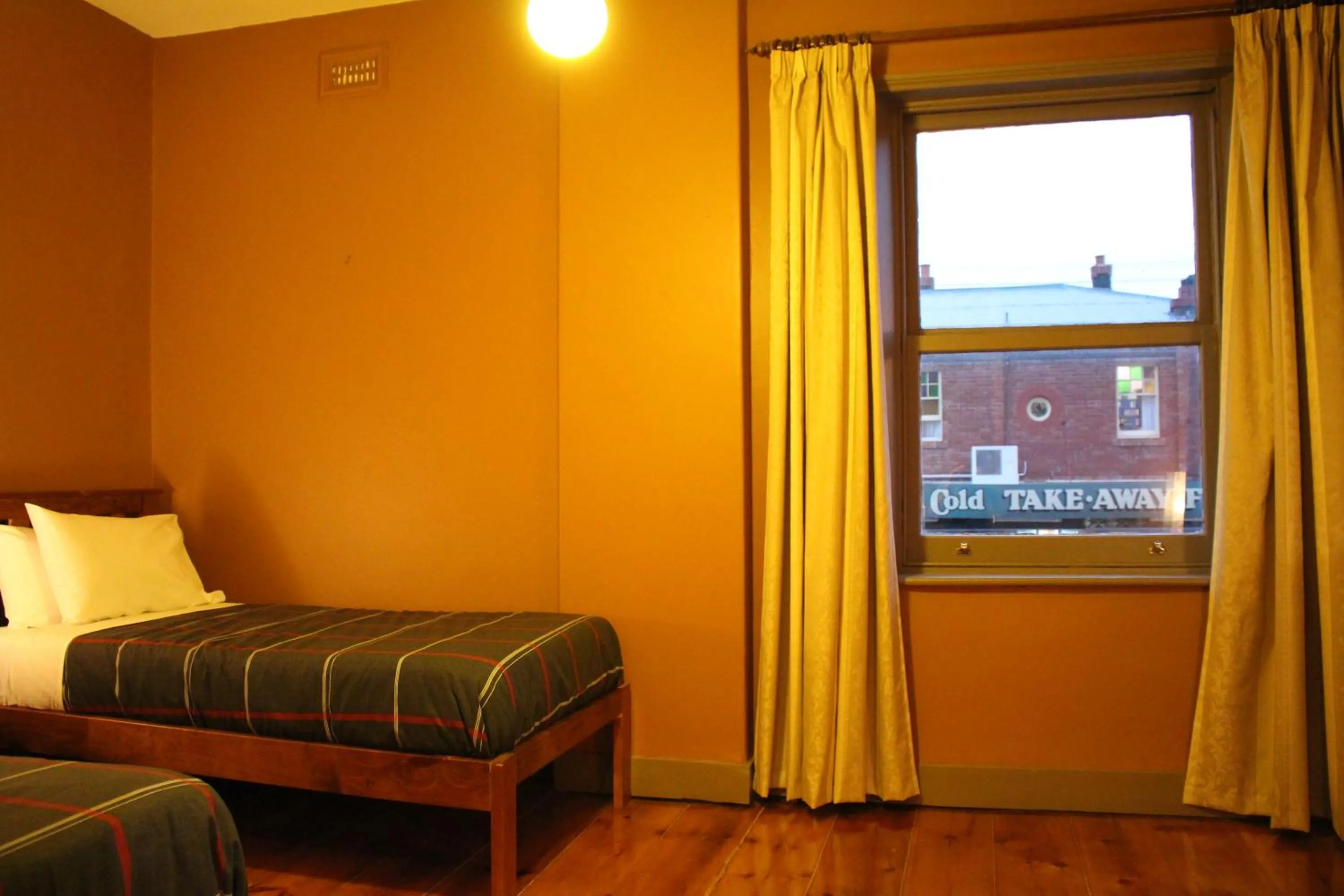 Bed in The Tasmanian Inn