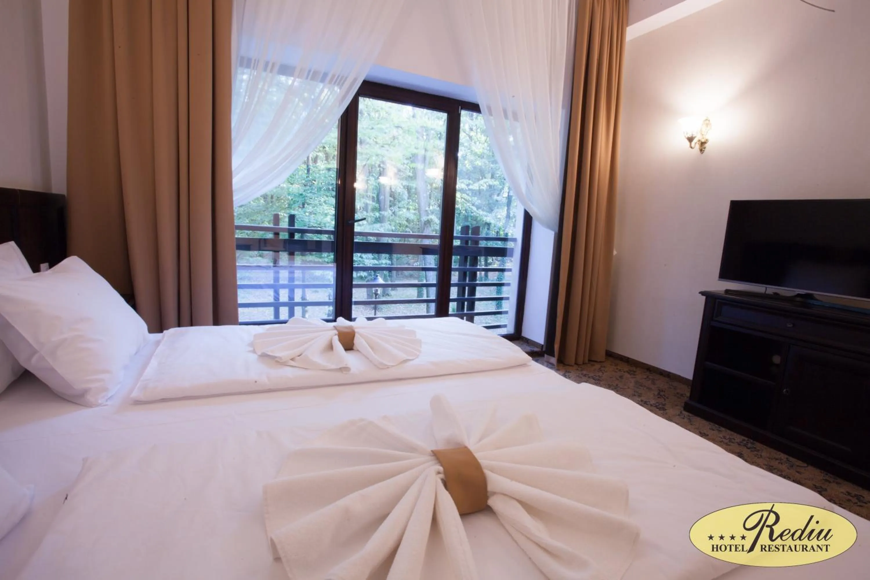 Photo of the whole room, Bed in Rediu Hotel & Restaurant