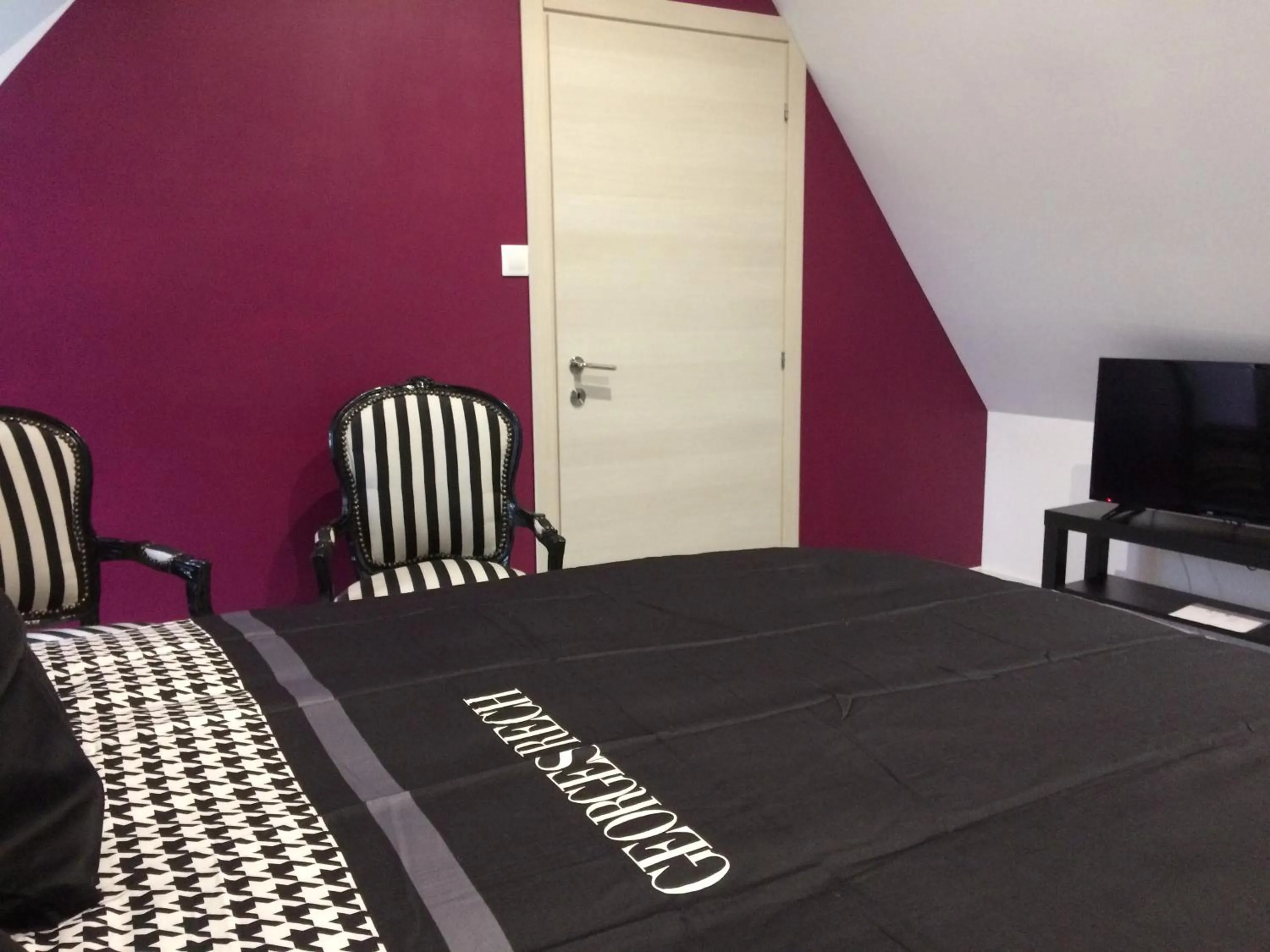 Bedroom, TV/Entertainment Center in Le Clos Dessyag