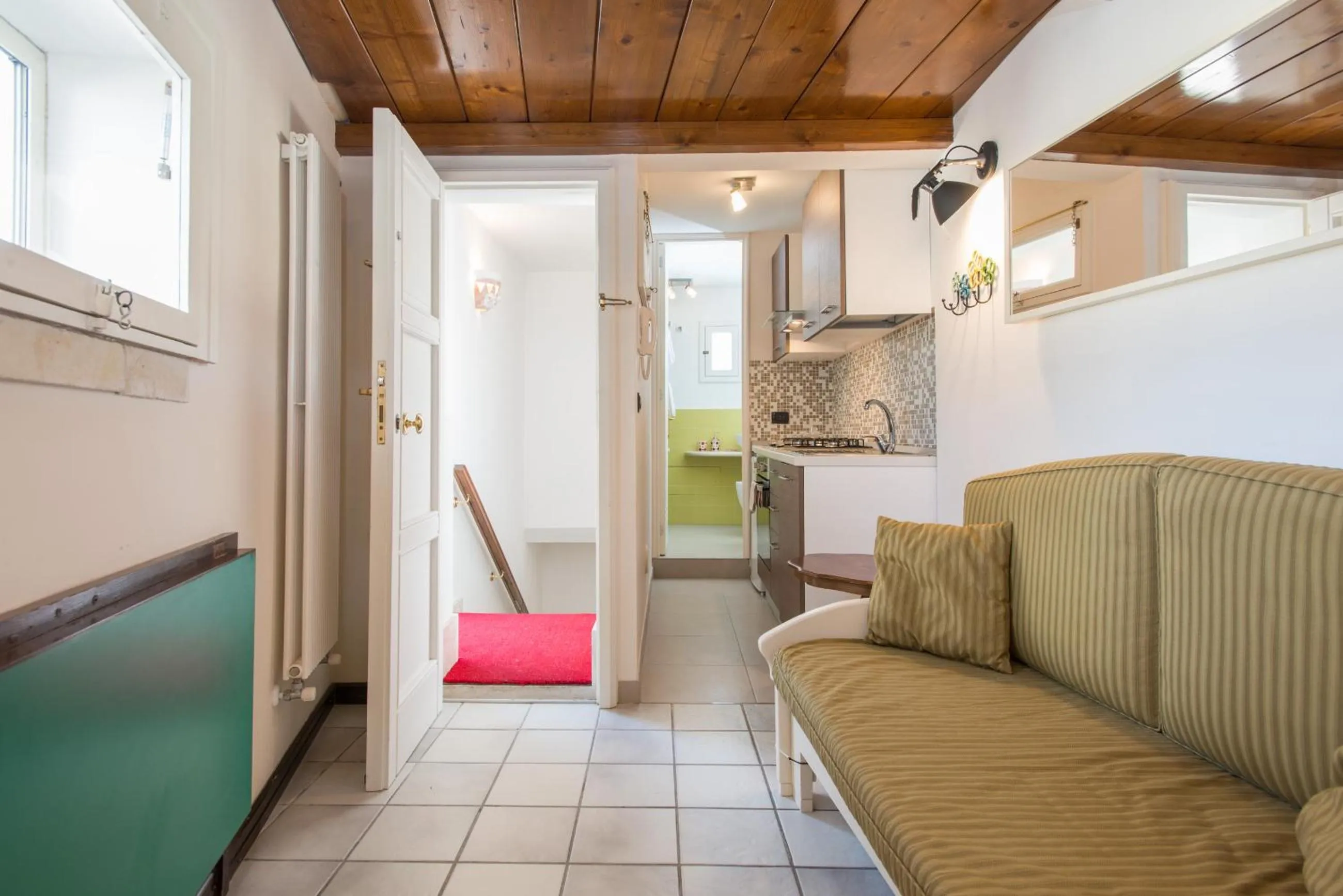 Kitchen or kitchenette in Il Garbino Suite and Apartment