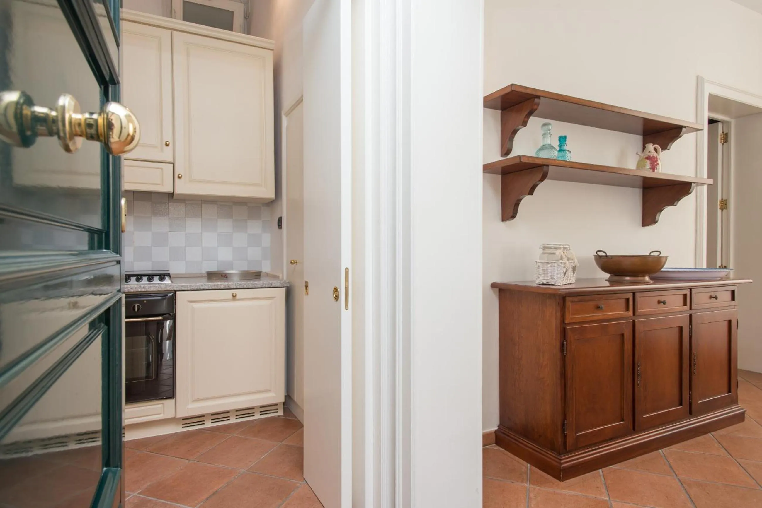Kitchen or kitchenette in Il Garbino Suite and Apartment
