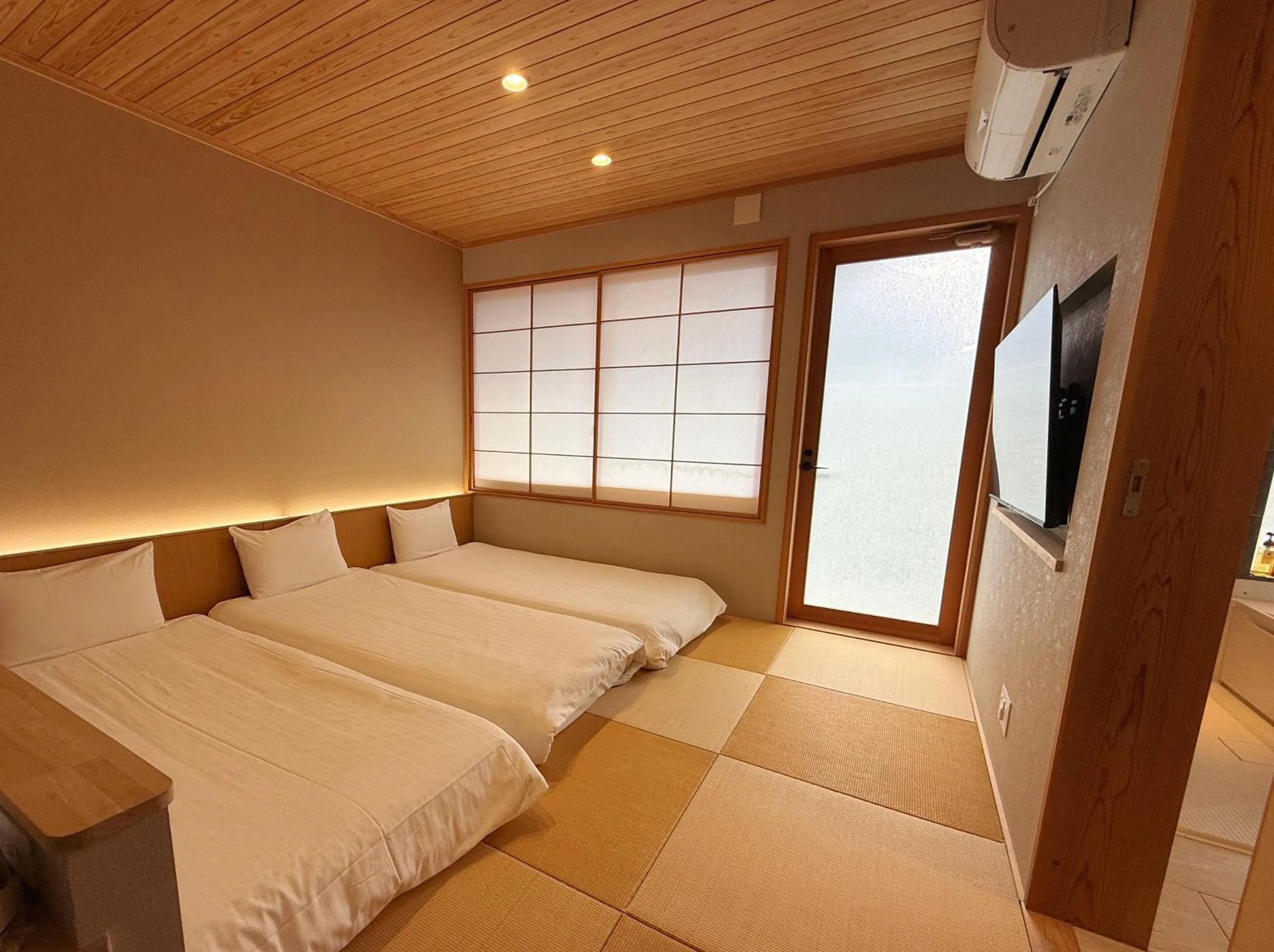 Bed in Kansai Airport Hotel Pine Villa