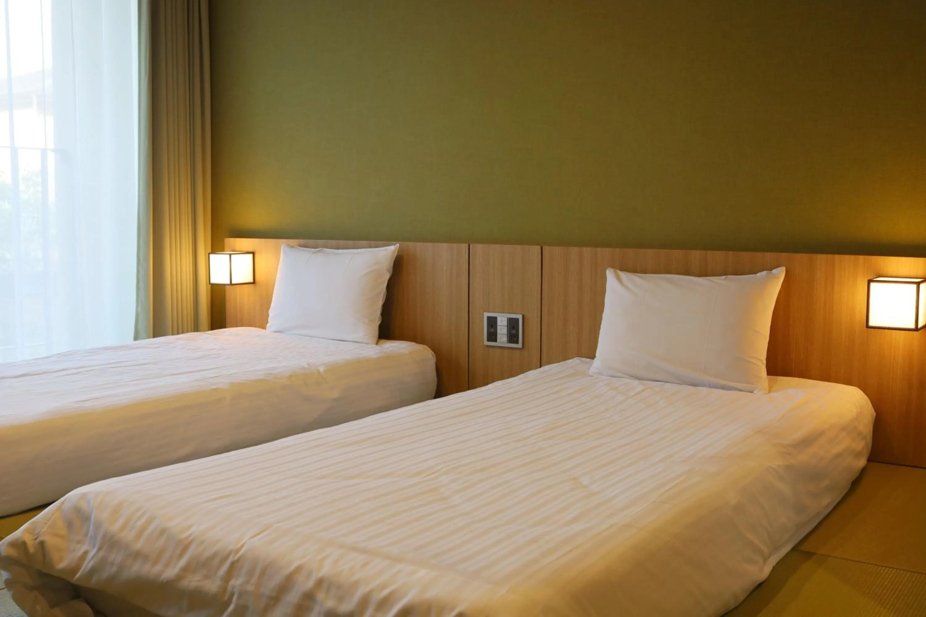 Bed in Kansai Airport Hotel Pine Villa