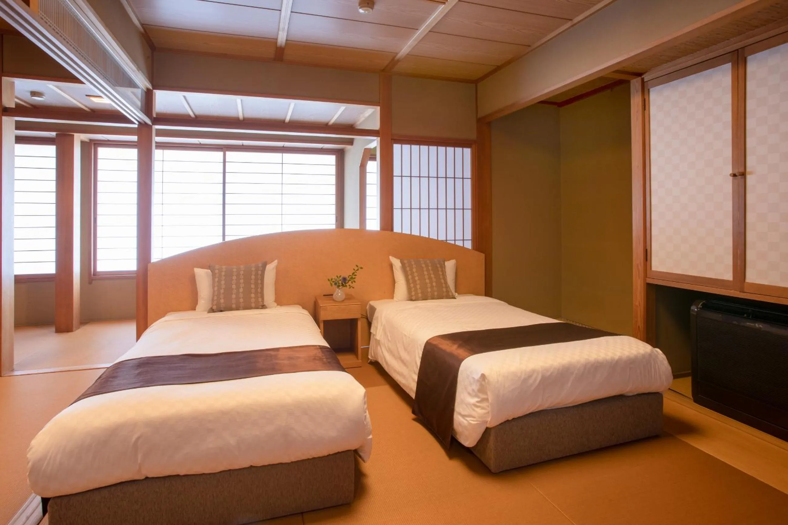 Bed in Ichiraku tendo spa & brewery