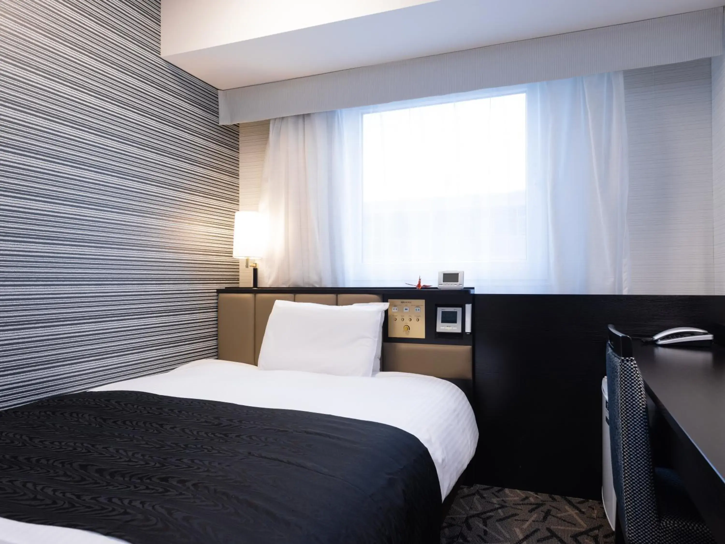 Photo of the whole room, Bed in APA Hotel Fukushima Ekimae Photo of the whole room, Bed in APA Hotel Fukushima Ekimae