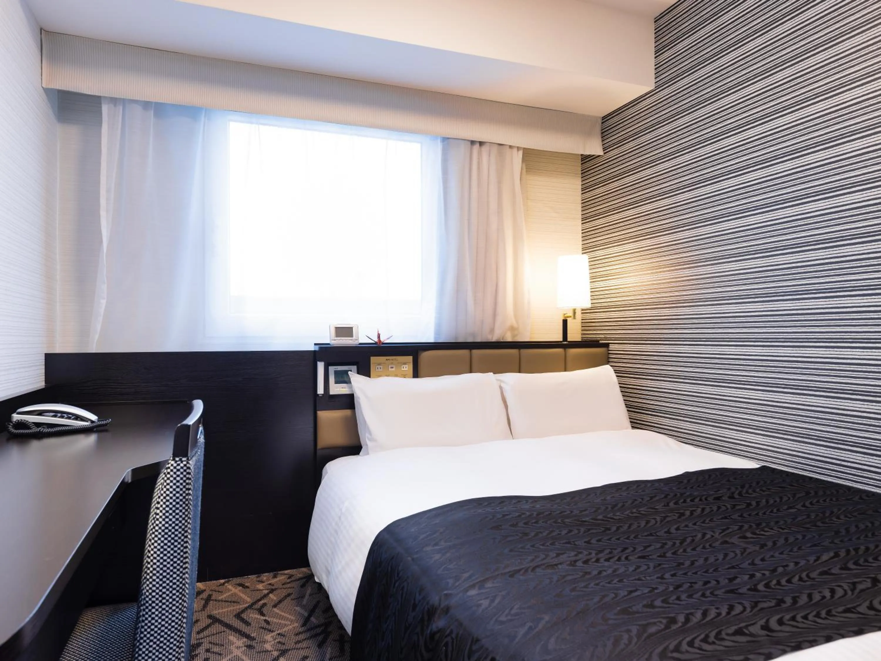 Photo of the whole room, Bed in APA Hotel Fukushima Ekimae