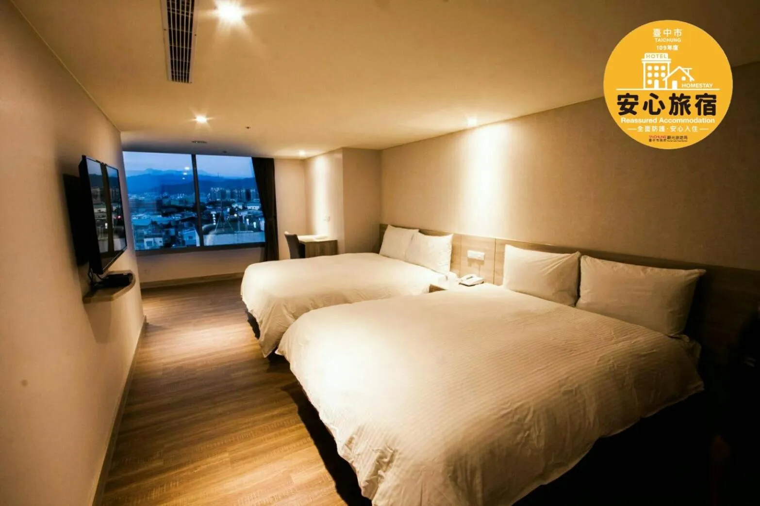 Bed in Golden Pacific Hotel