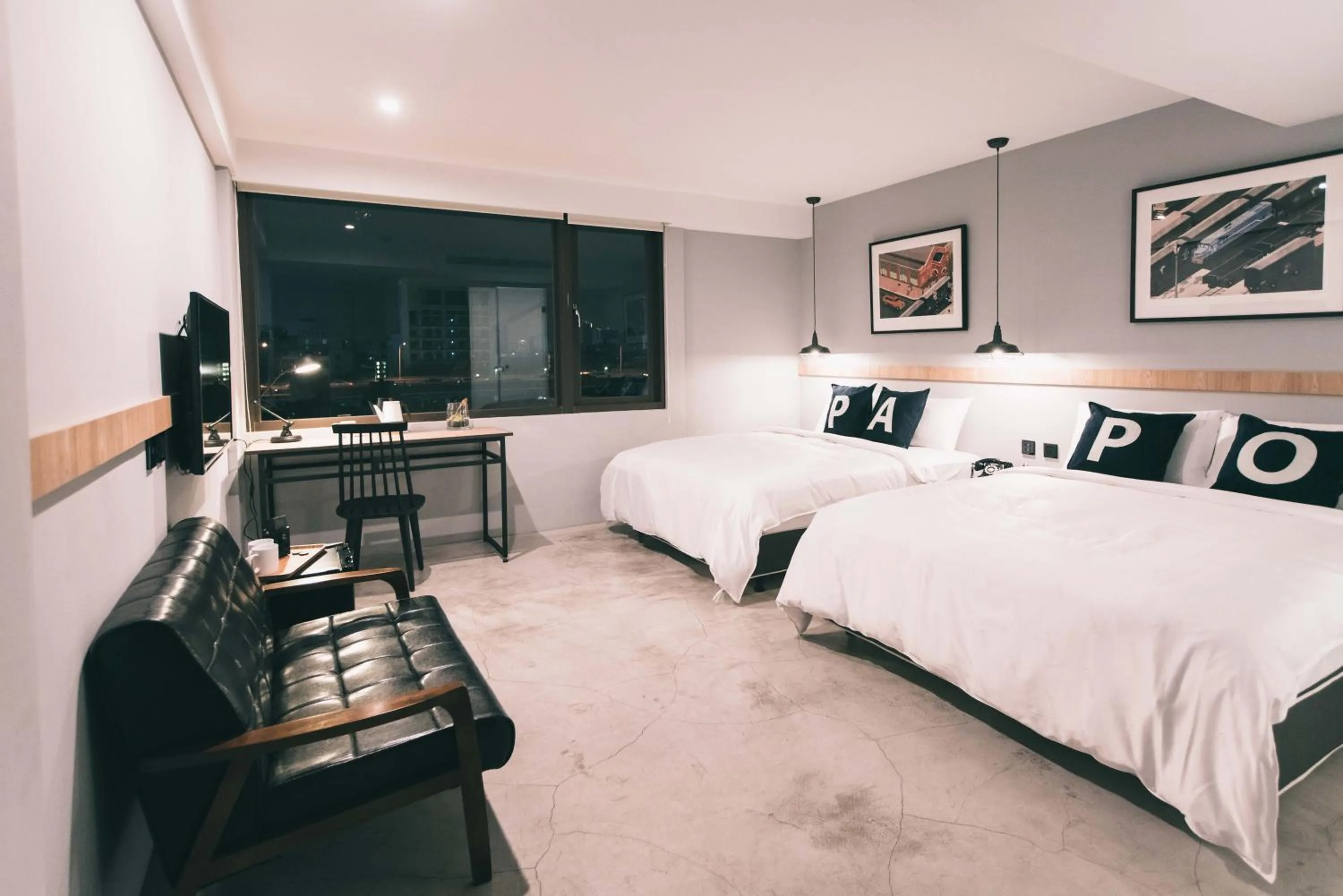 Living room, Bed in PAPO'A Hotel