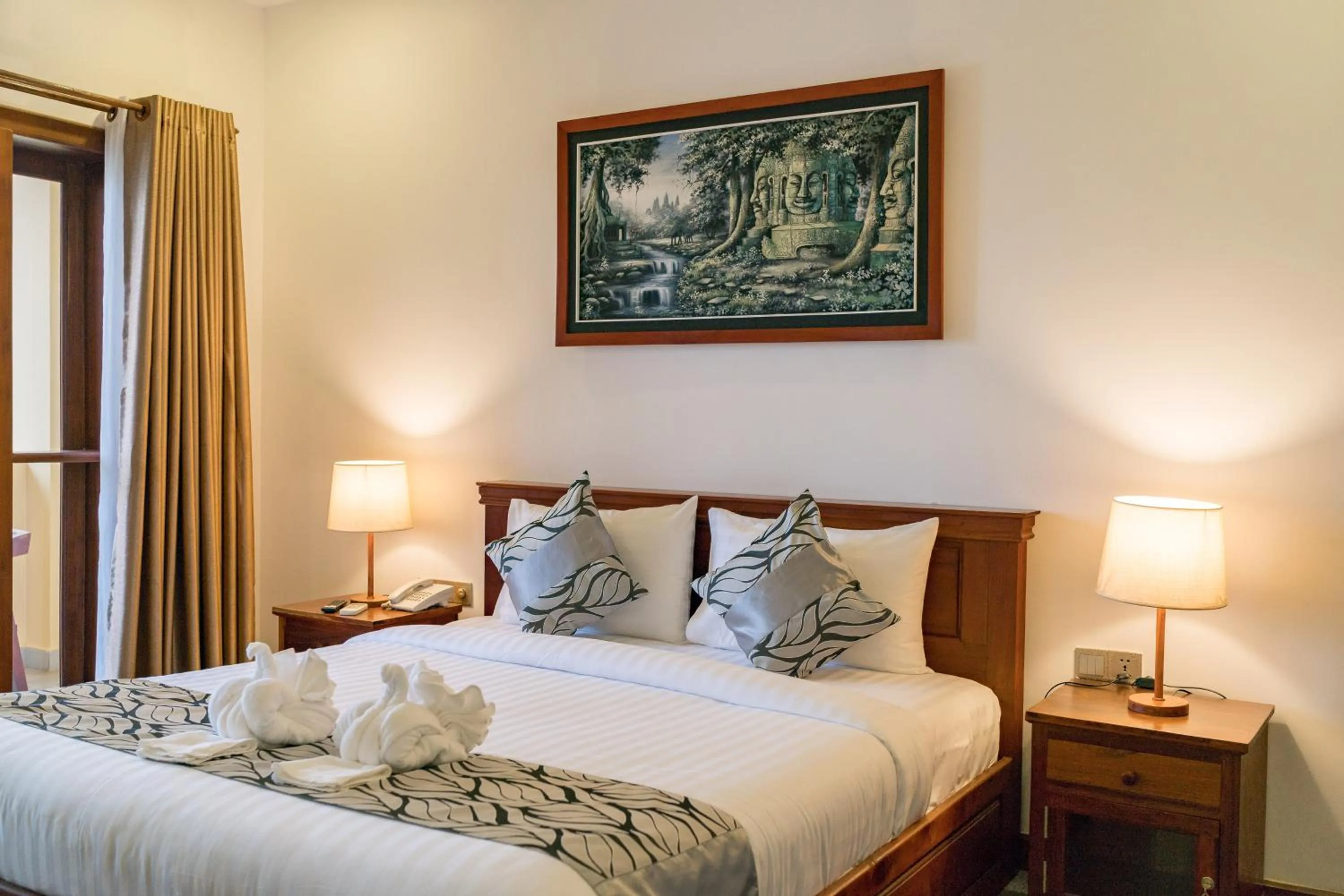 Living room, Bed in Savada Angkor Boutique Hotel