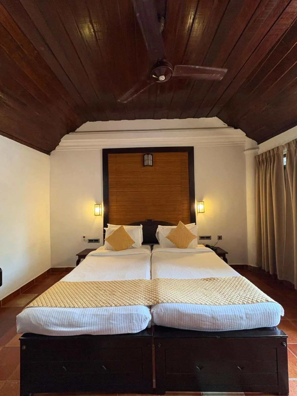 Bedroom, Bed in Kumarakom Tharavadu - A Heritage Hotel, Kumarakom By Perfect Stays