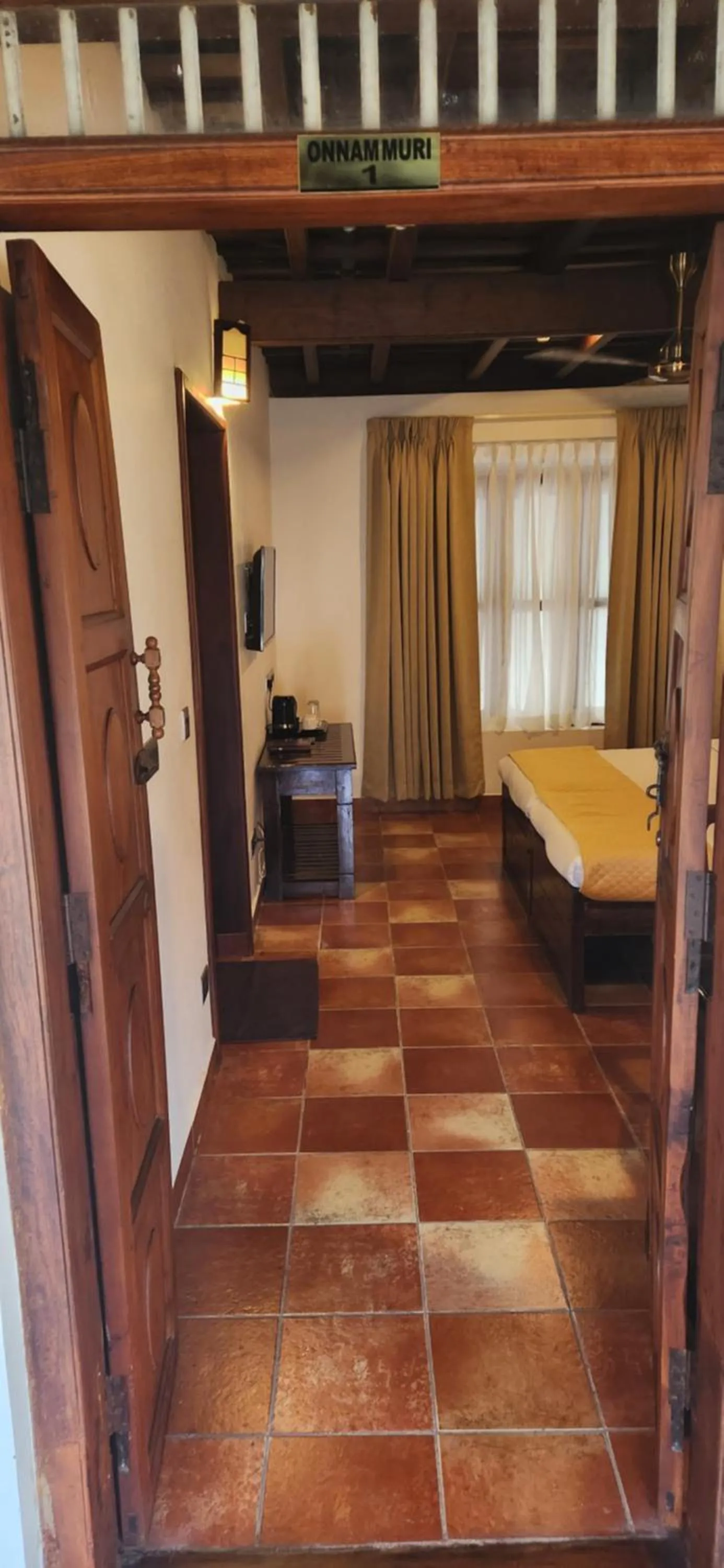 Bedroom, Bed in Kumarakom Tharavadu - A Heritage Hotel, Kumarakom By Perfect Stays
