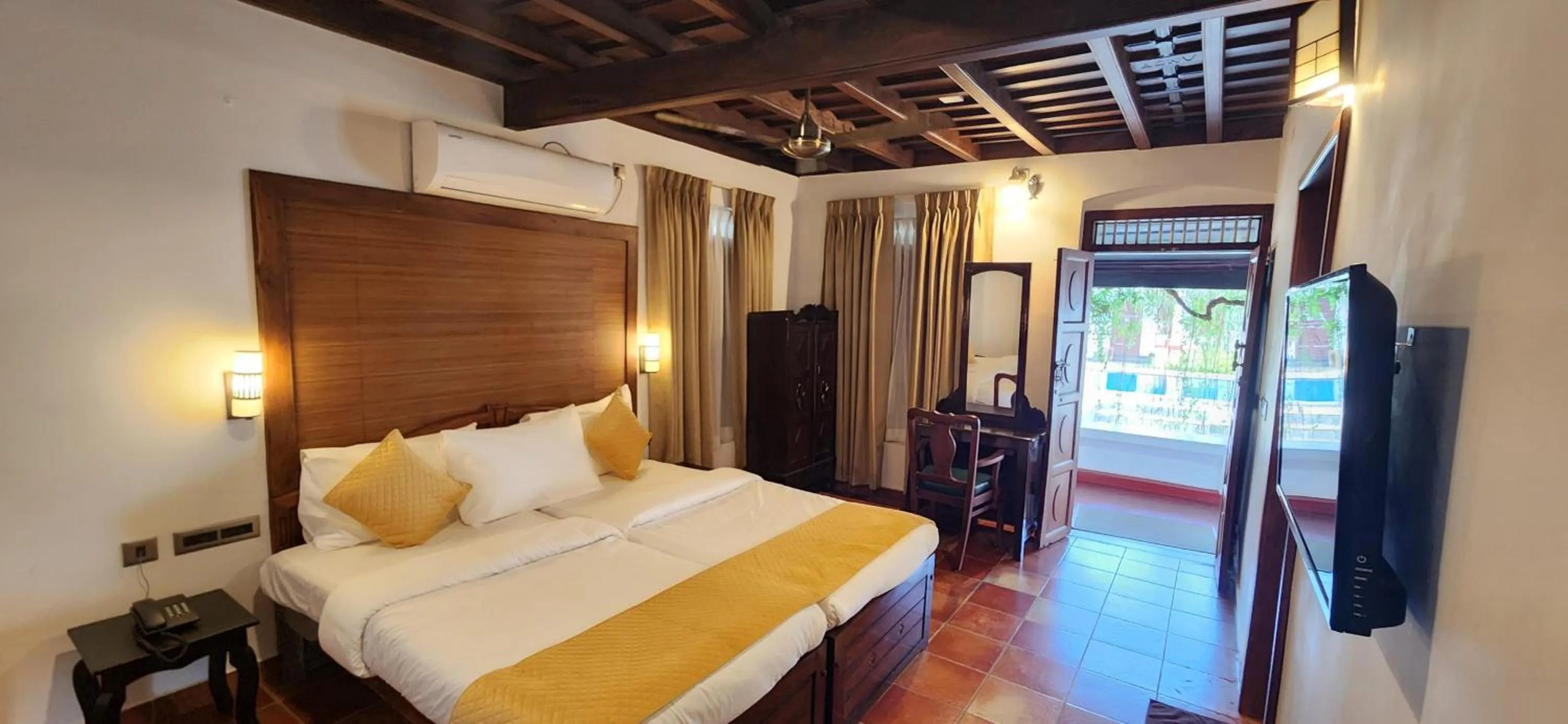 Bed in Kumarakom Tharavadu - A Heritage Hotel, Kumarakom By Perfect Stays
